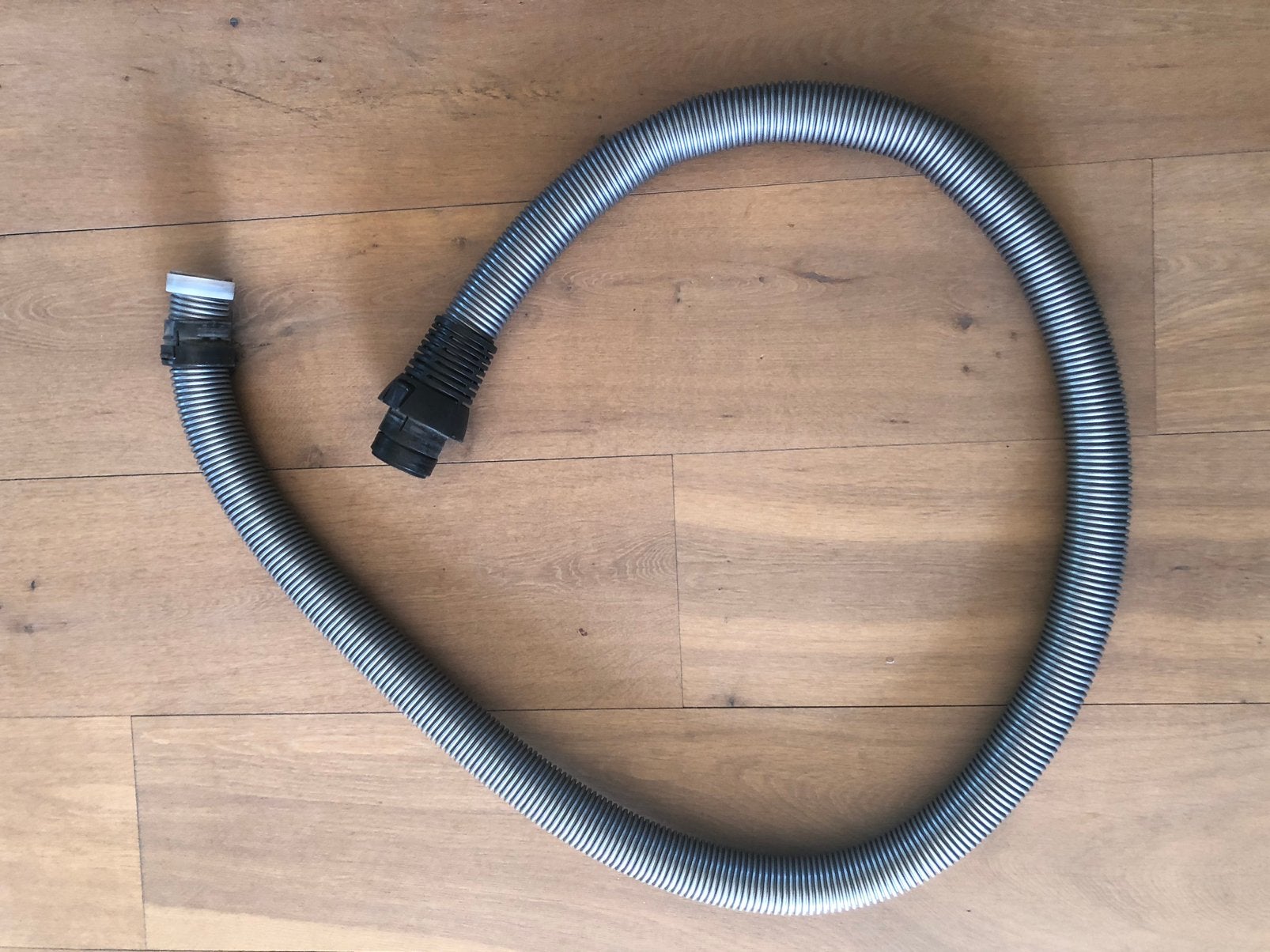 Originele Miele stofzuigerslang, Witgoed en Apparatuur, Ophalen of Verzenden, Zo goed als nieuw, 1200 tot 1600 watt