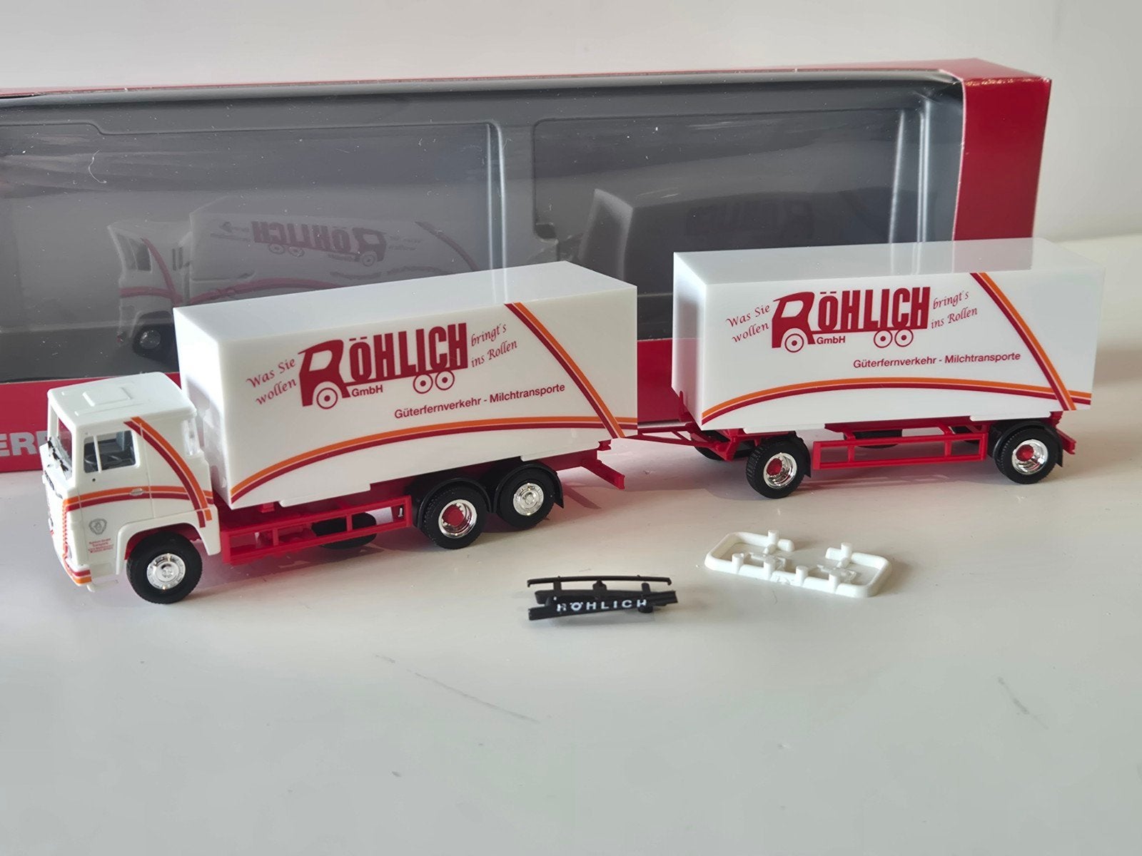 Herpa Scania 111 Röhlich, Hobby en Vrije tijd, Modelauto's | 1:87, Ophalen of Verzenden, Nieuw, Bus of Vrachtwagen, Herpa