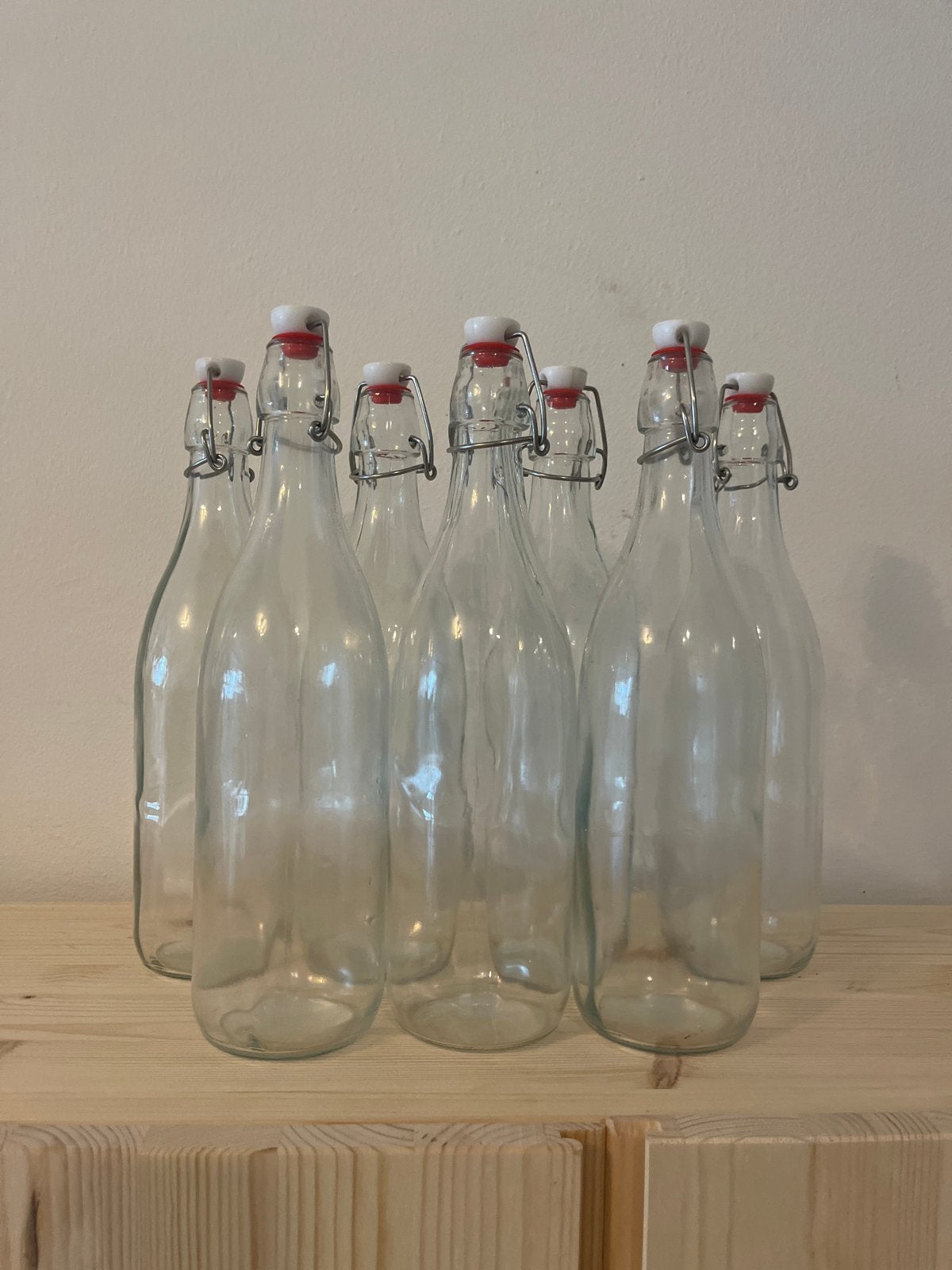 Set van 7 Glazen Flessen met Beugeldop - 1 Liter, Ophalen, Zo goed als nieuw, Glas
