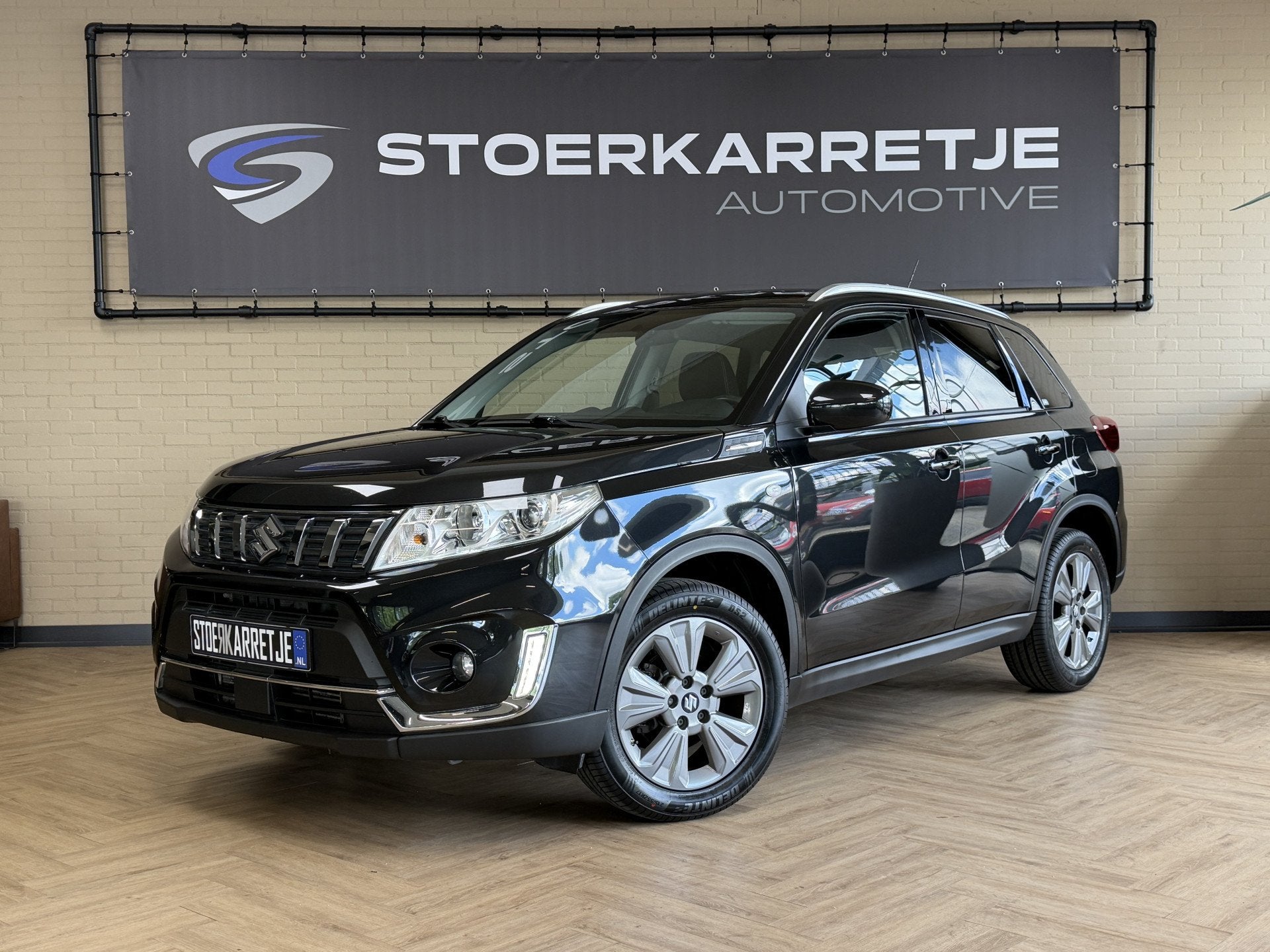 Suzuki Vitara 1.4 Boosterjet Comfort | Navi | Stoelverwarmin, Voorwielaandrijving, Stof, Gebruikt, Zwart