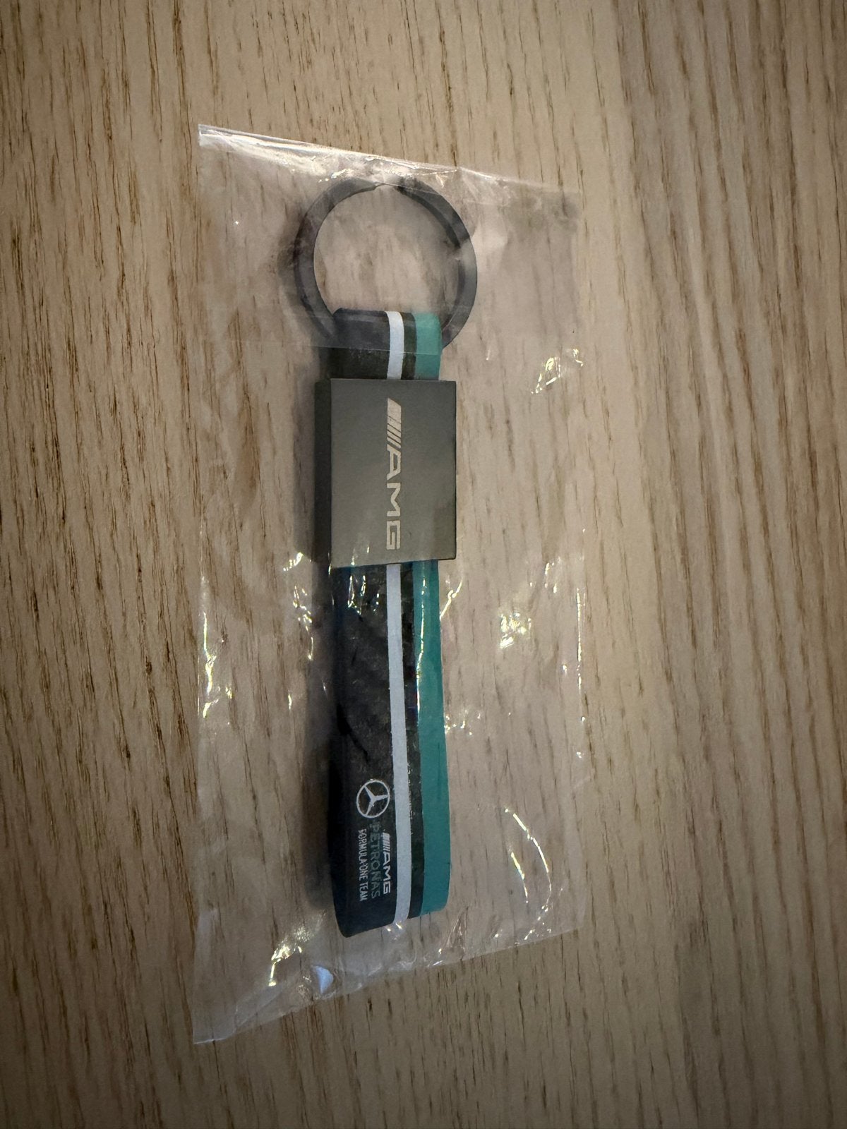 Mercedes AMG F1 sleutelhanger, Verzamelen, Ophalen of Verzenden, Nieuw, Merk