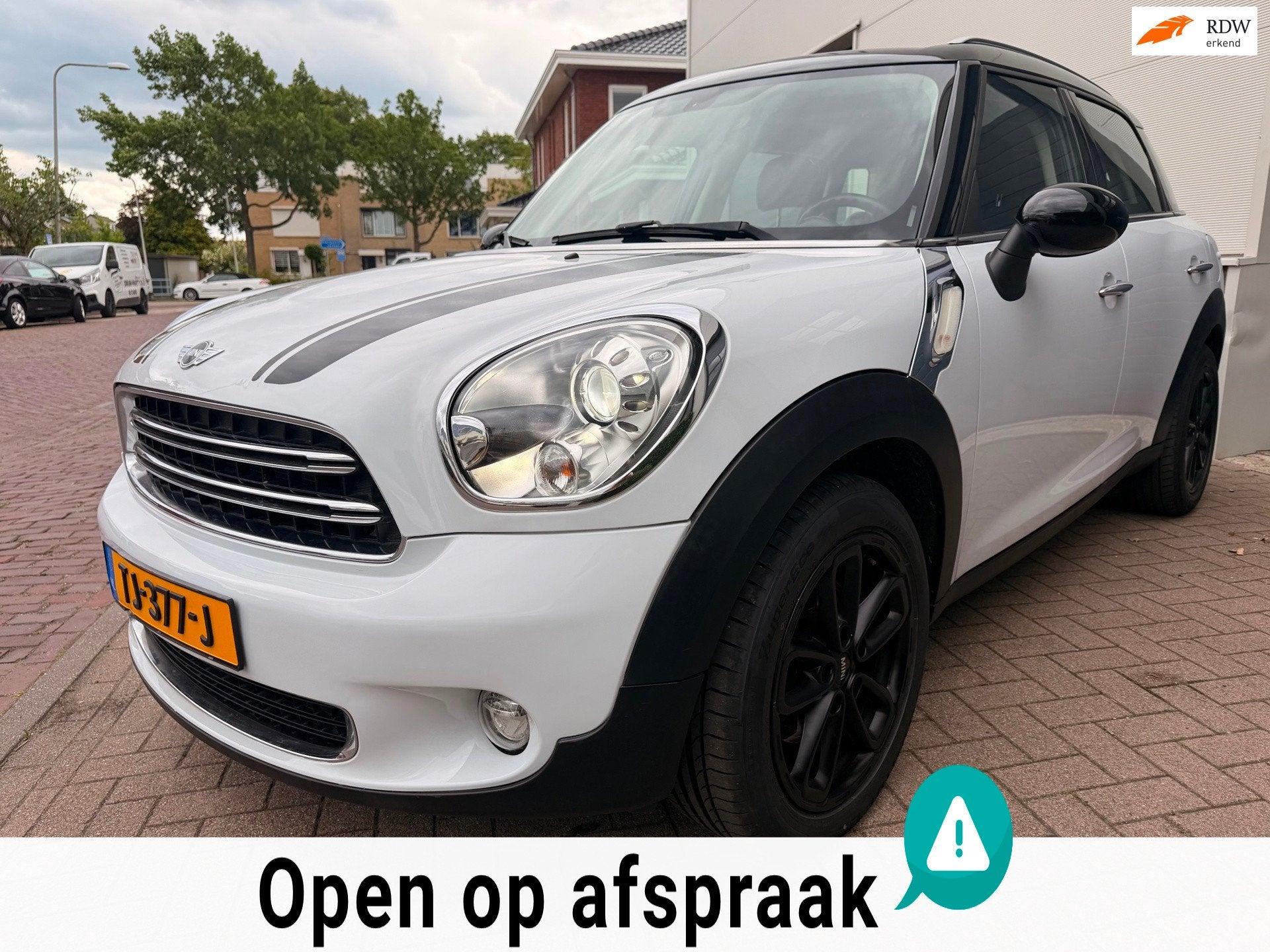 Mini Countryman 1.6 Cooper Chili/Pano/Leder/Navi/Stoel verwa, Auto's, Voorwielaandrijving, Gebruikt, Euro 6, Leder en Stof