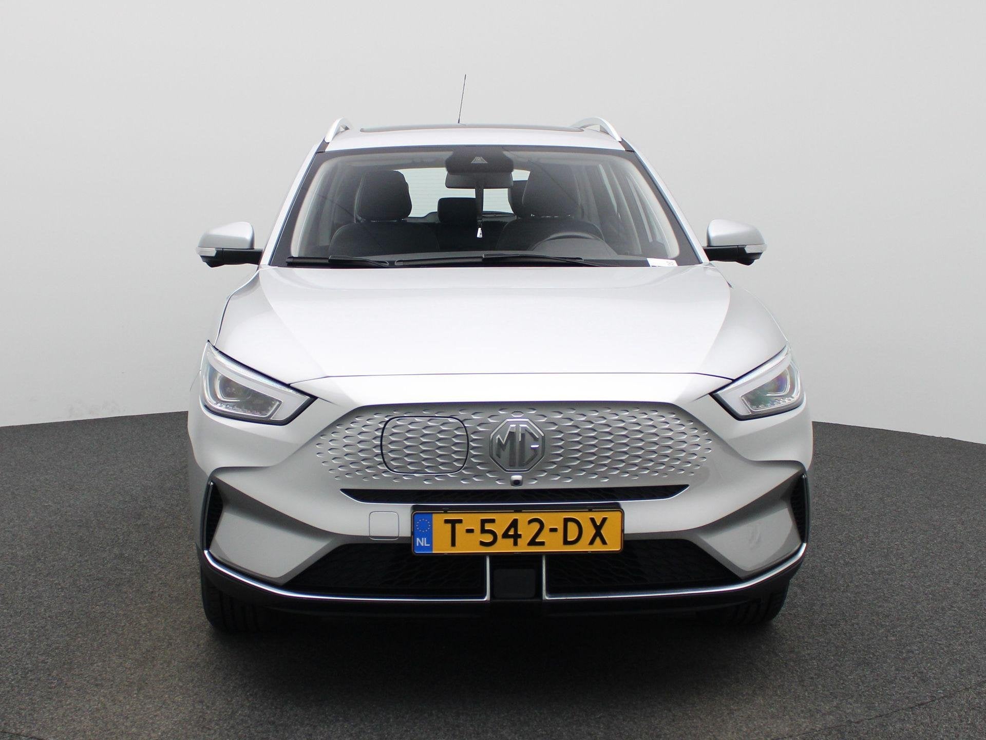 MG ZS EV Long Range Luxury 70 kWh 3-fase 11kW-lader | Leder, Auto's, 12 maanden, Gebruikt, ZS, Origineel Nederlands