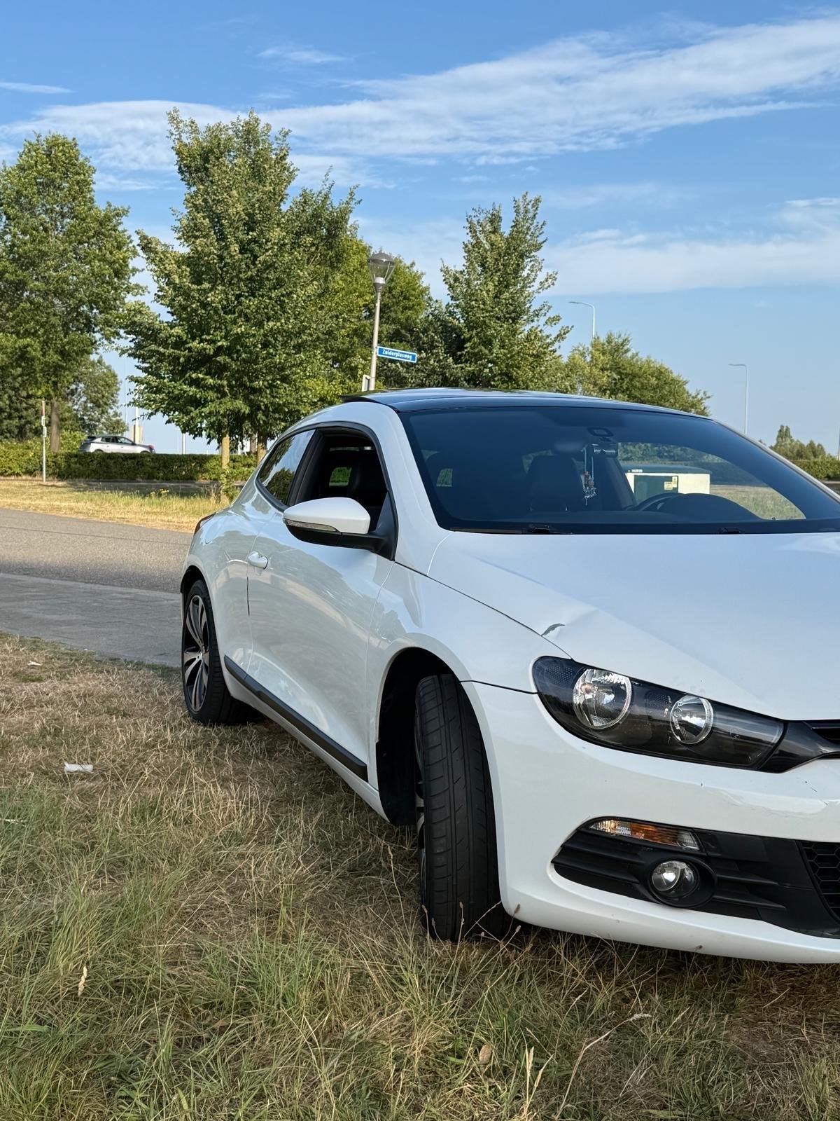 Volkswagen Scirocco 1.4 TSI 90KW 2011 Wit, Auto's, Volkswagen, Voorwielaandrijving, 4 cilinders, 4 stoelen, 1219 kg