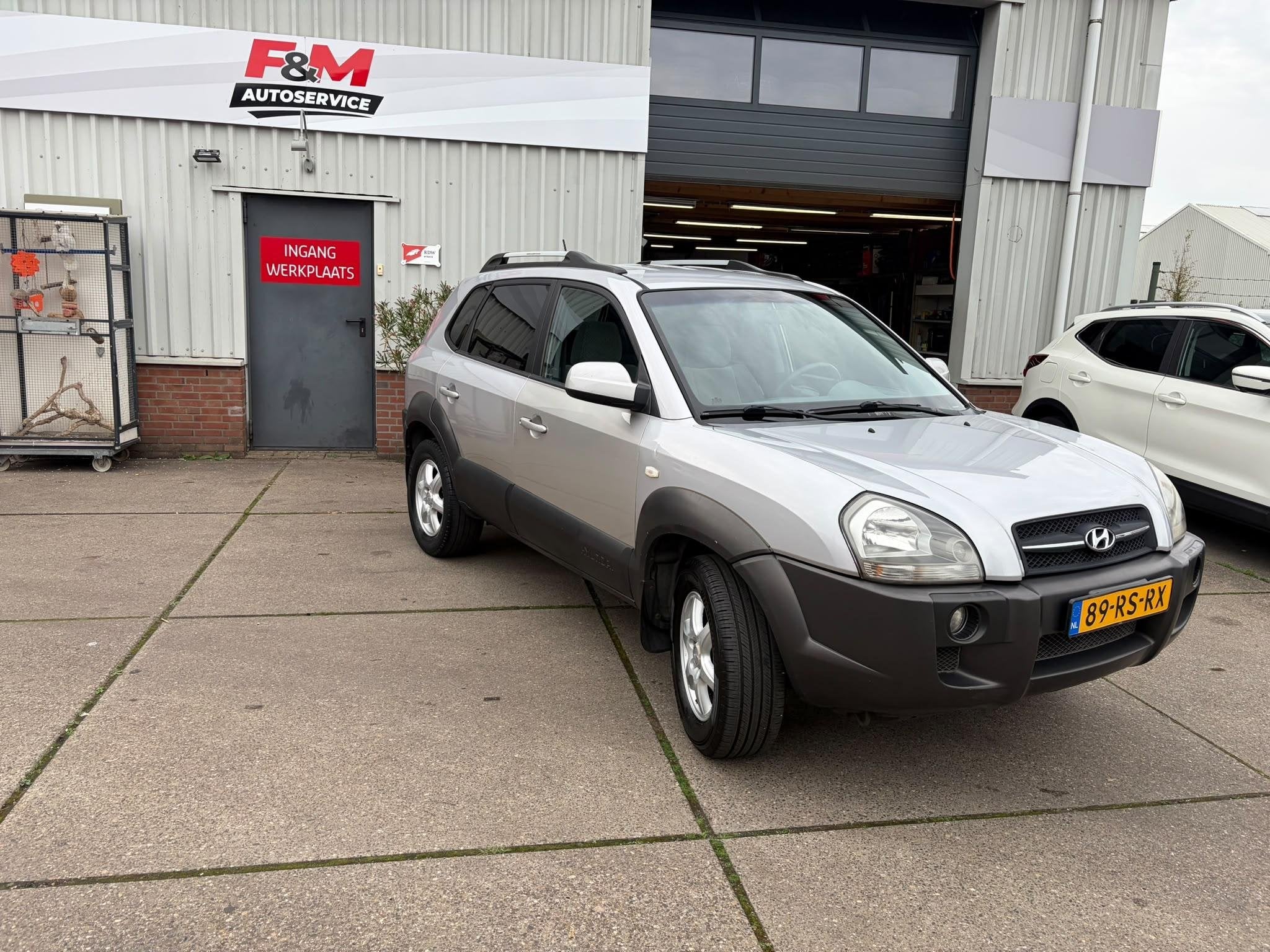Hyundai Tucson 2.0i Style Clima, cruise, radio, trekhaak, Auto's, Stof, Gebruikt, 4 cilinders, Handgeschakeld