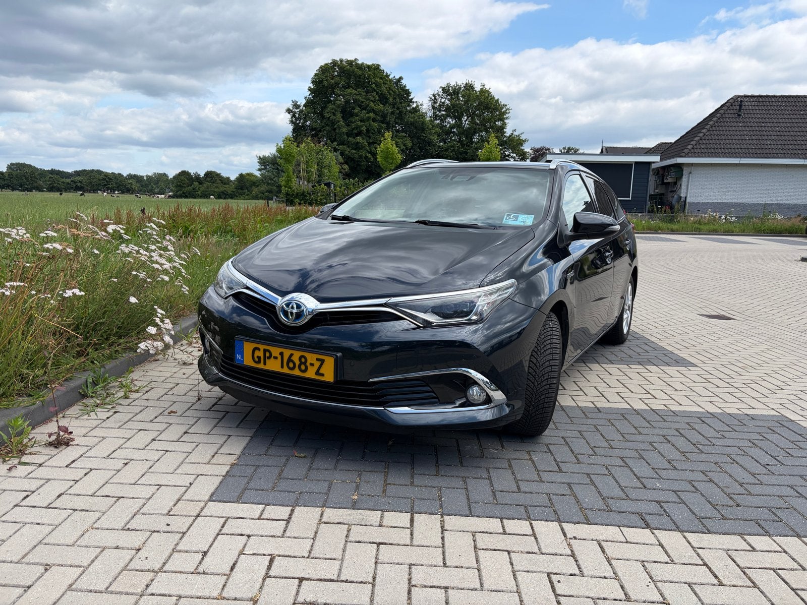 Toyota Auris 1.8 Hybrid Touring Sports CVT 2015 donker BLAUW