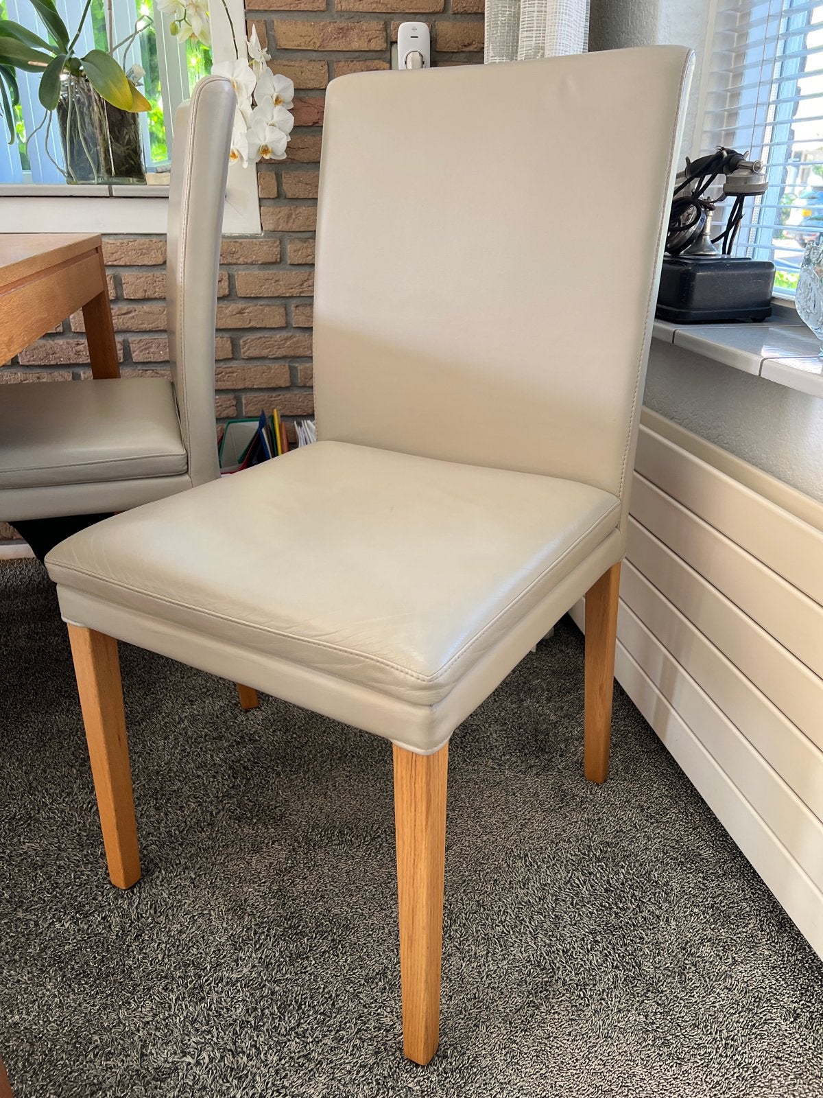 4 Hülsta Eetkamerstoelen - Crème Leer en Hout, Huis en Inrichting, Ophalen, Gebruikt, Overige kleuren, Eén