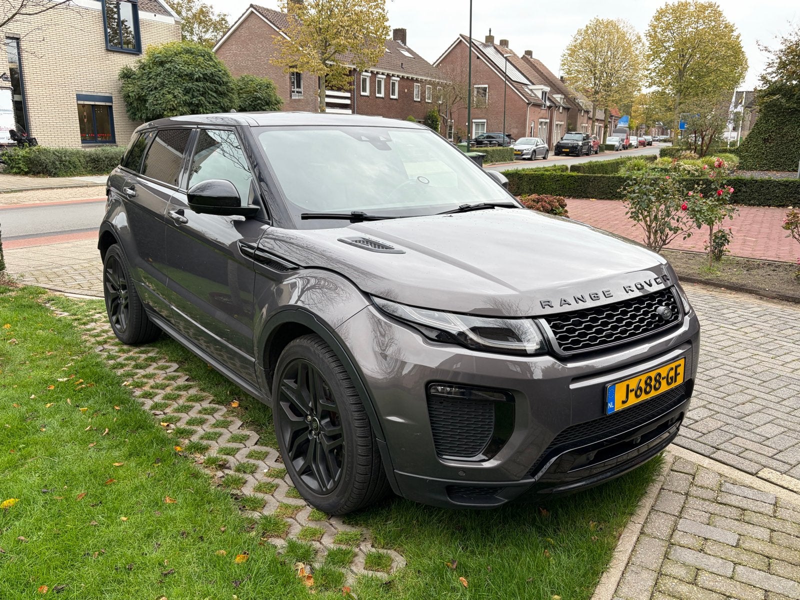 Land Rover Range Rover Evoque 2.0 TD4 4WD AUT 2015 Grijs, Auto's, Automaat, Dealer onderhouden, 2000 kg, 179 pk