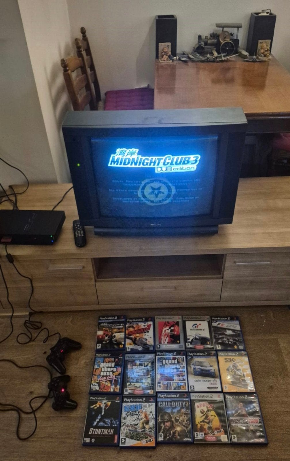 playstation 2 met 15 games en retro tv, Spelcomputers en Games, Ophalen of Verzenden, Gebruikt, Controller, PlayStation 1