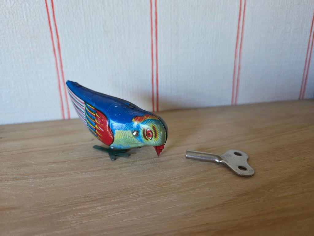 Vintage blikken speelgoed vogel van Bluebird, Antiek en Kunst, Ophalen of Verzenden