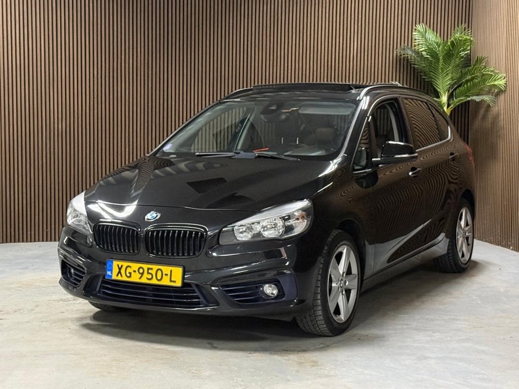 BMW 2 Serie Active Tourer 218i High Executive (bj 2015), Auto's, Voorwielaandrijving, 136 pk, Gebruikt, Zwart