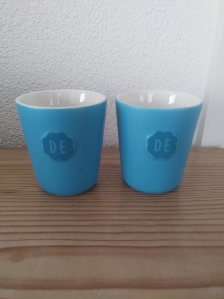 Douwe Egberts 2 blauwe kopjes zonder oor, senseoformaat, Huis en Inrichting, Keuken | Servies, Ophalen of Verzenden, Porselein