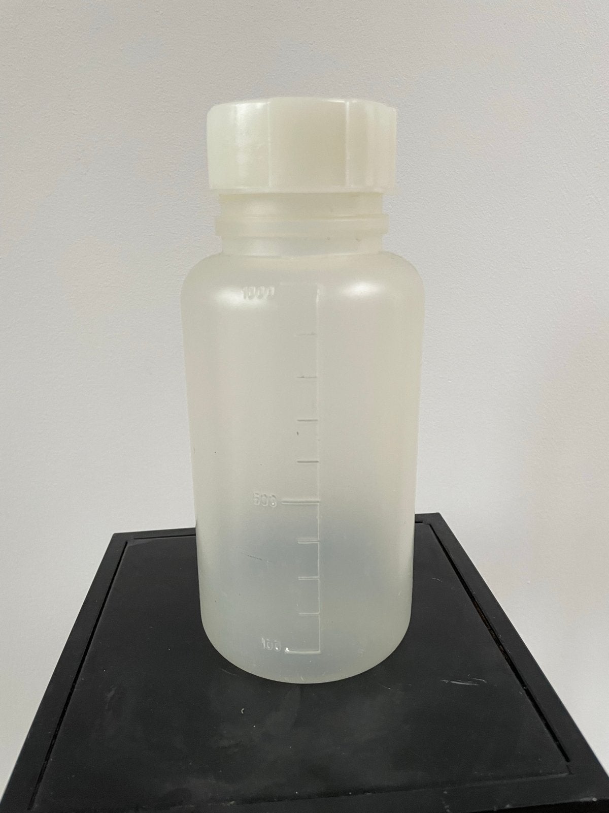 Kunststof fles 1 l, Overige typen, Ophalen of Verzenden, Zo goed als nieuw, Kunststof