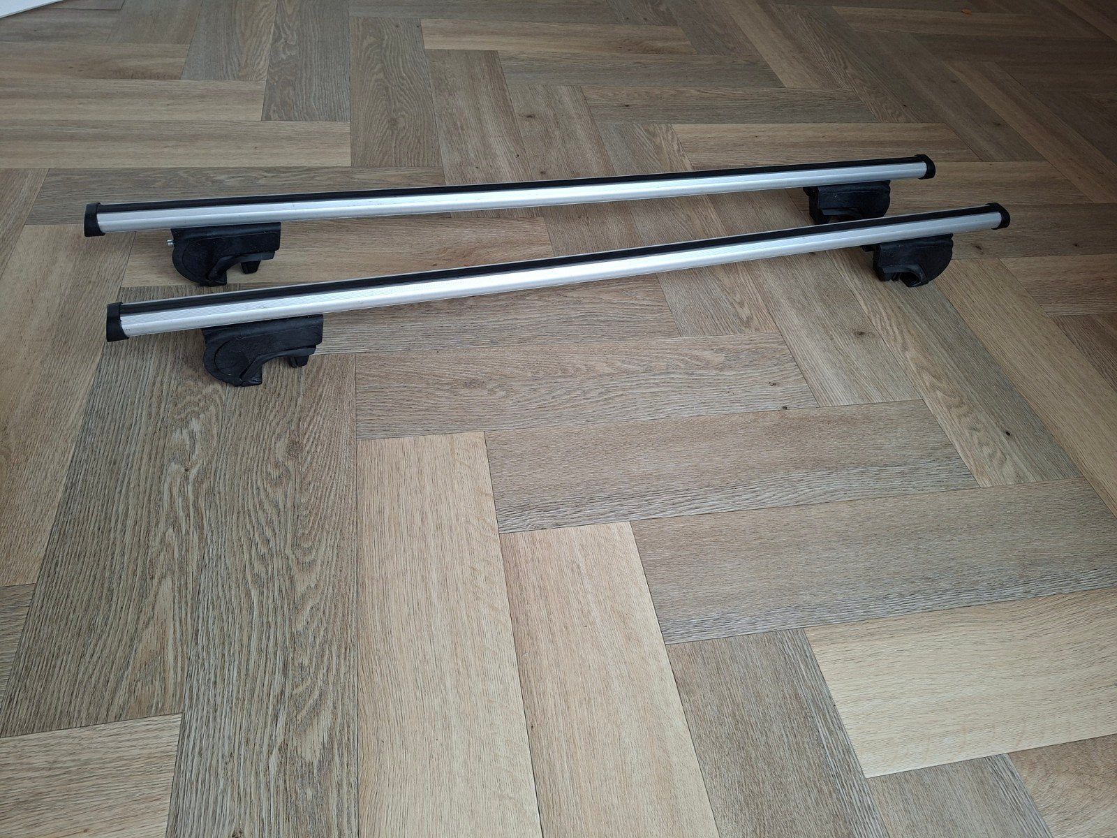 Universele dakdragers open rails, Ophalen