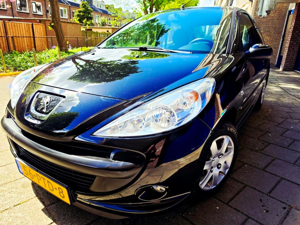 Peugeot 206+ 1.4cc  57.000 km!, Auto's, Peugeot, Voorwielaandrijving, 206+, Stof, Zwart
