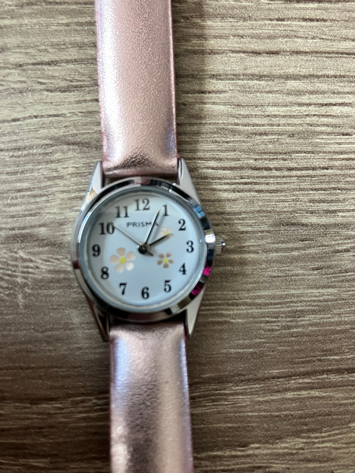 Prisma kinderhorloge met bloemetjes - Roze, Sieraden, Tassen en Uiterlijk, Ophalen of Verzenden, Zo goed als nieuw, Roze, Meisje