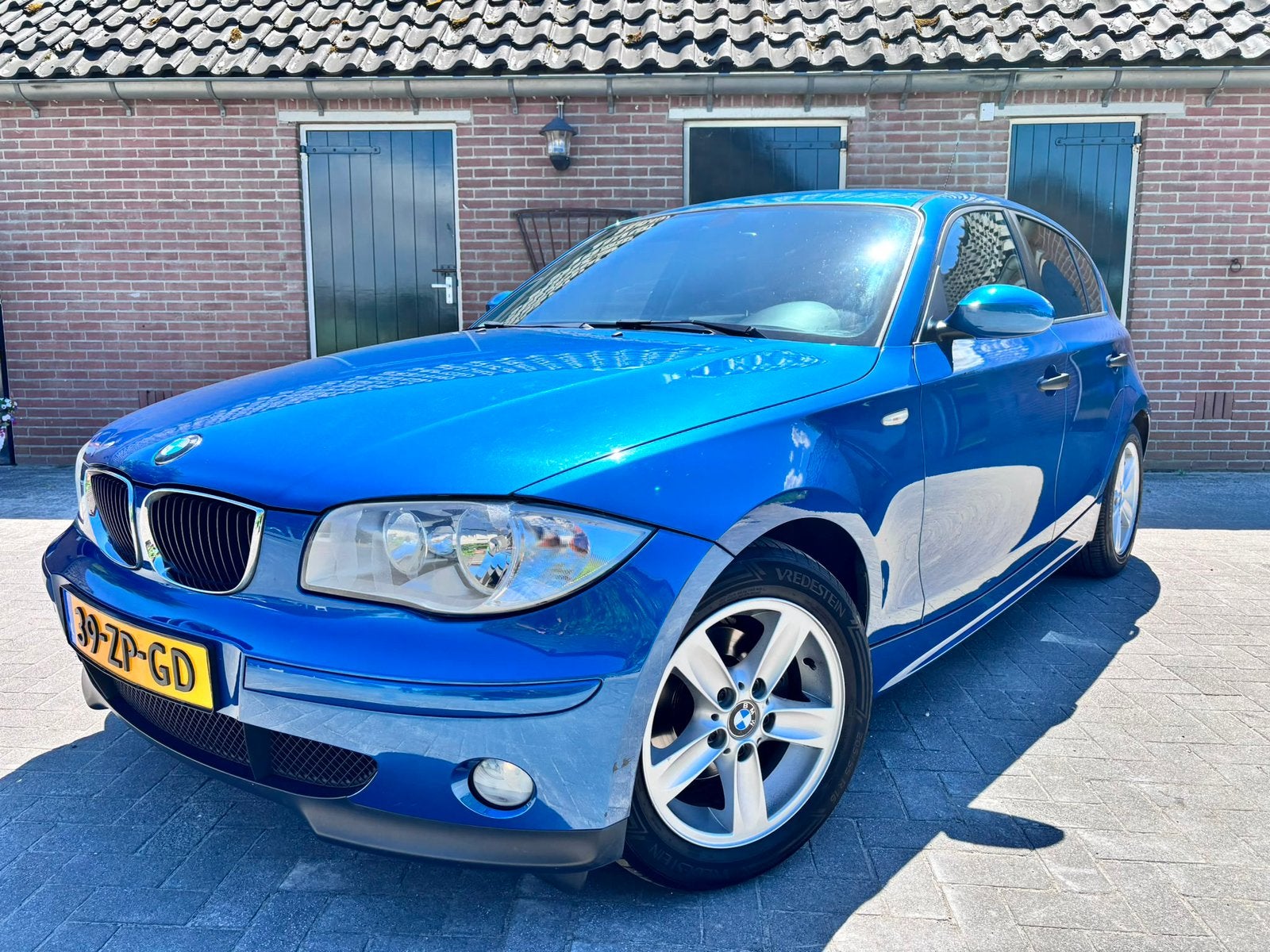 BMW 1-Serie 118I AUT 2007 Blauw, Auto's, BMW, 1995 cc, Zwart, 4 cilinders, 129 pk