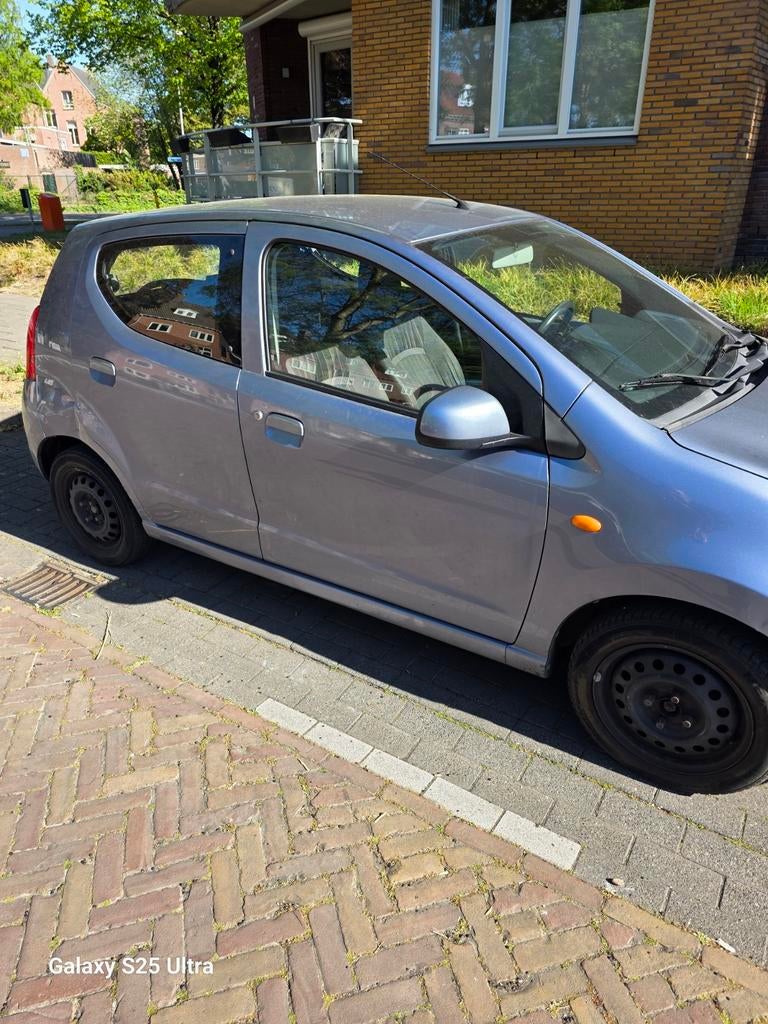 Nissan Pixo 1.0 50KW 5D 2009 Blauw, Auto's, Voorwielaandrijving, 200 kg, Handgeschakeld, 3 cilinders