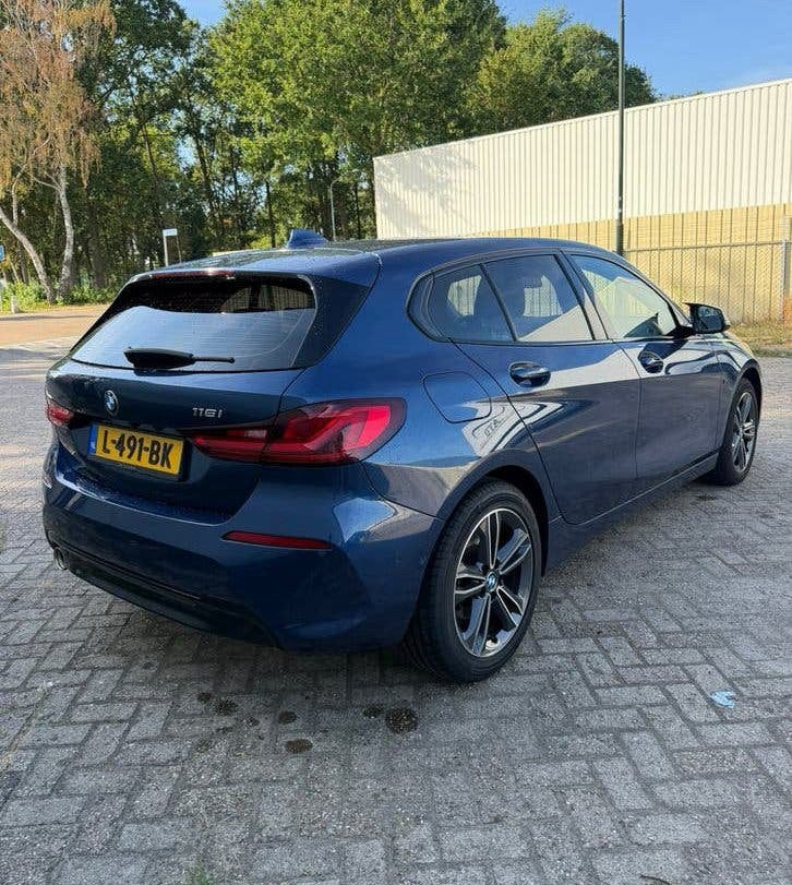 BMW 1-Serie 118i 136pk Aut 2021 Leer|Navi|Camera|M-stijl, Auto's, BMW, 136 pk, Blauw, Particulier, Multifunctioneel stuurwiel