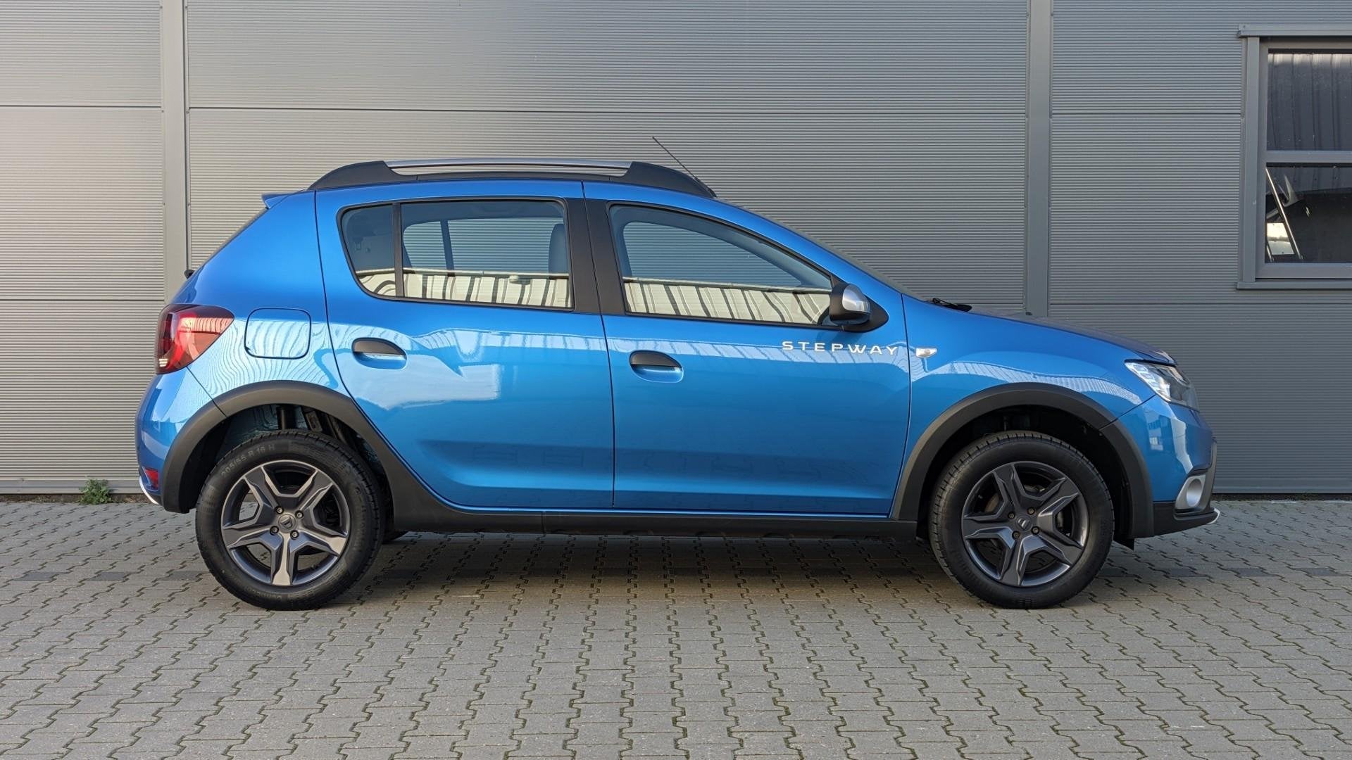Dacia Sandero 0.9 TCe 90pk SL Stepway | Trekhaak | Navigatie, Auto's, Stof, Euro 6, Verwarmde buitenspiegels, Blauw