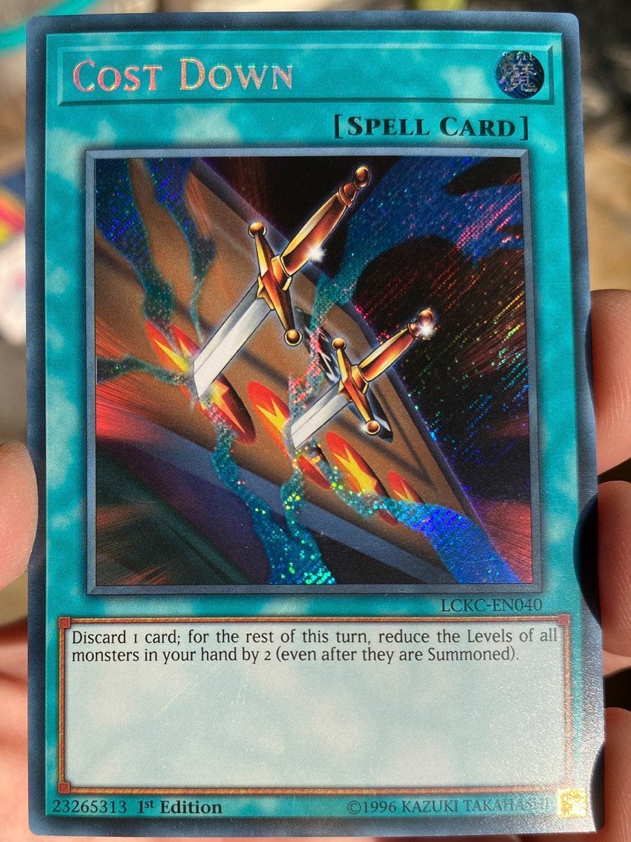 Yu-Gi-Oh! Cost Down LCKC 1st Edition !, Hobby en Vrije tijd, Verzamelkaartspellen | Yu-gi-Oh!, Ophalen of Verzenden, Zo goed als nieuw