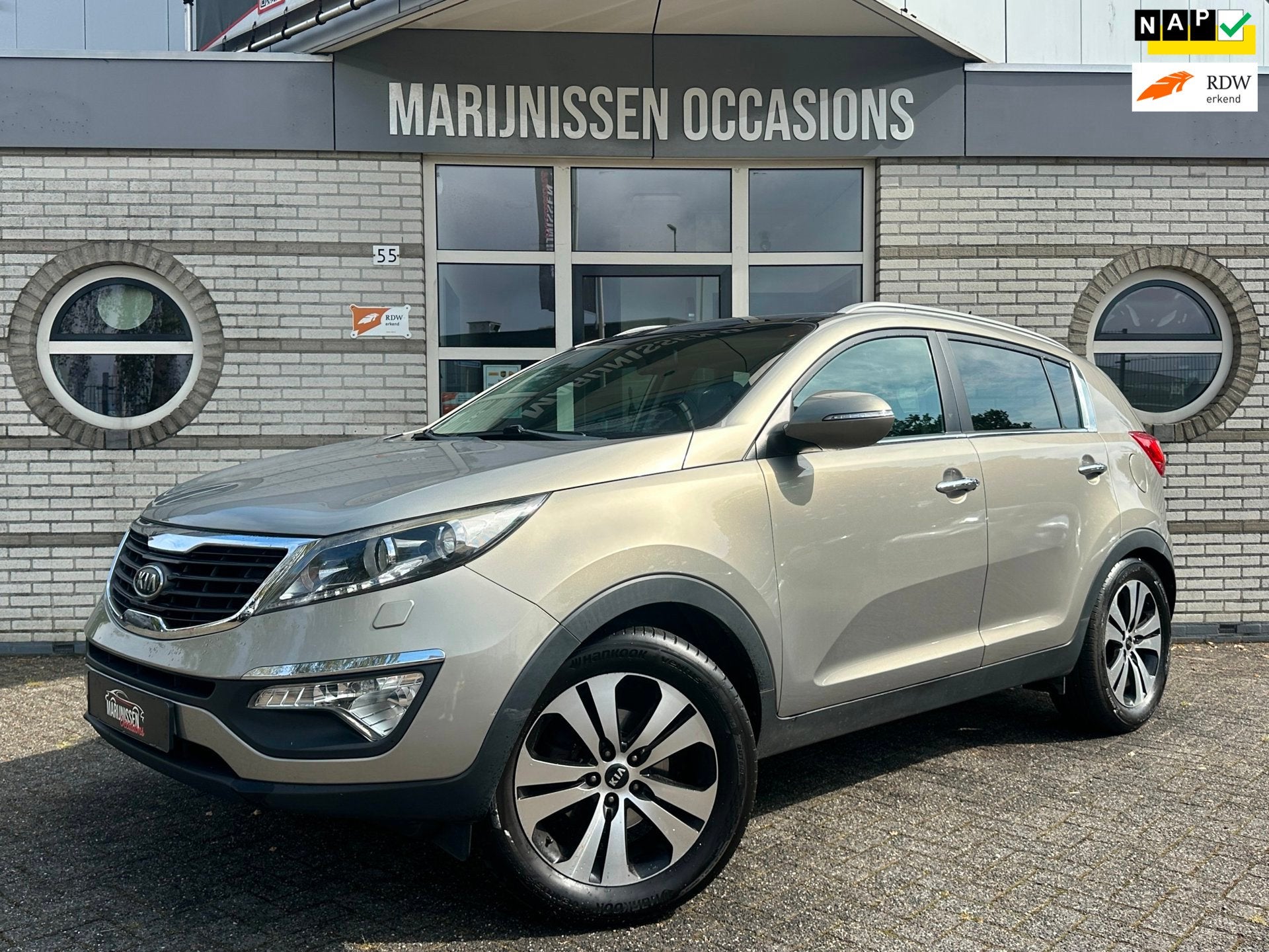Kia Sportage 2.0 X-clusive |1e EIG|Full Option|, Auto's, Gebruikt, Zwart, 4 cilinders, 163 pk