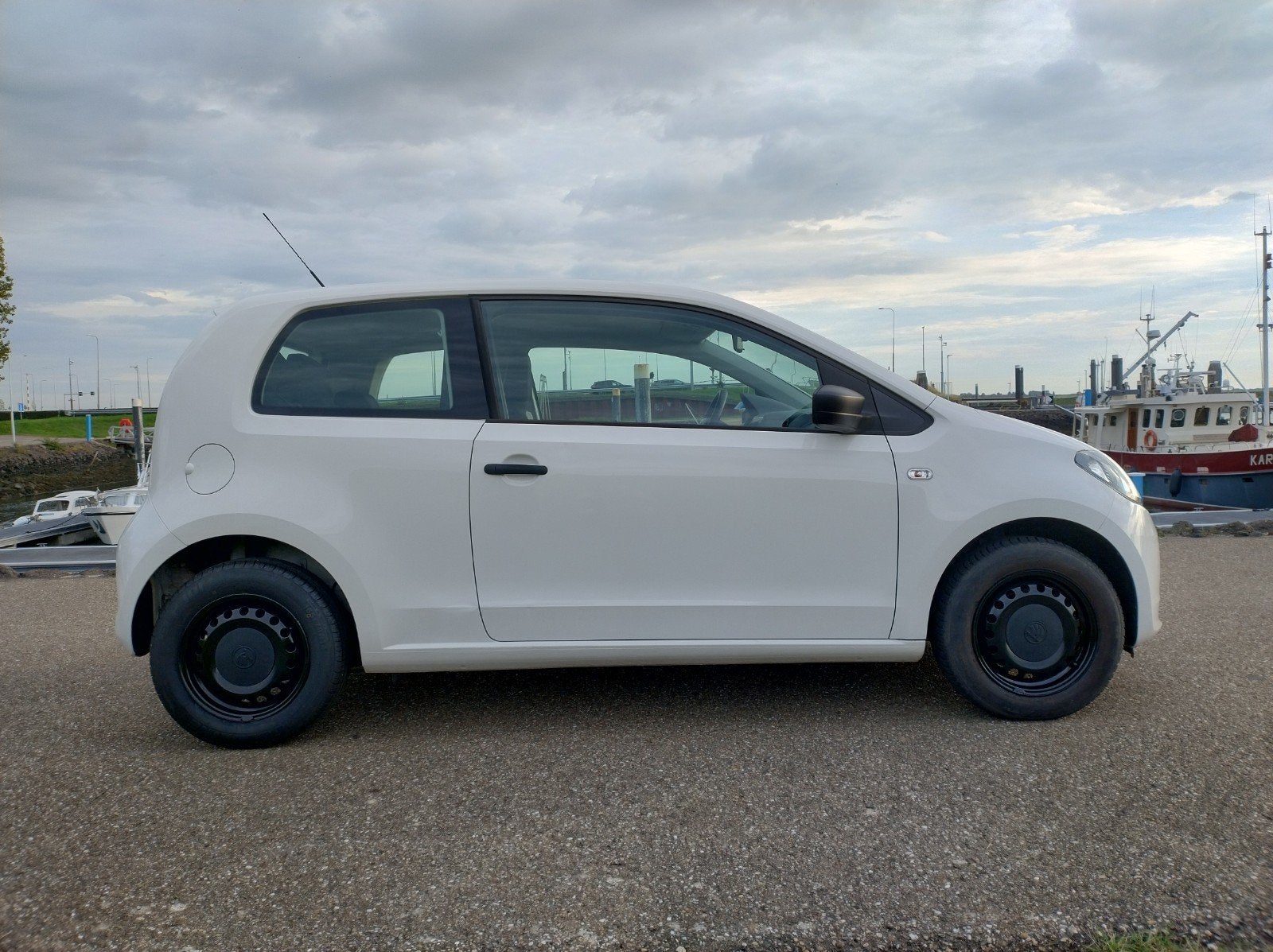 Skoda Citigo 1.0 2012 92.352 km, Voorwielaandrijving, Stof, 4 stoelen, Wit