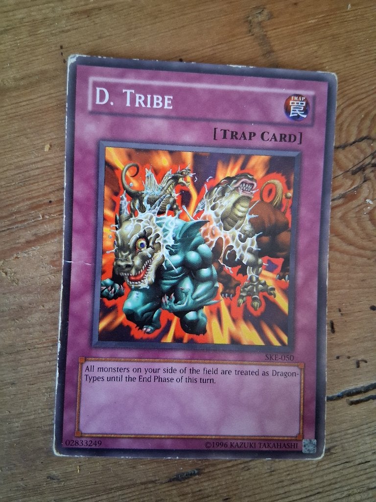 Yu-Gi-Oh Card D. Tribe, Hobby en Vrije tijd, Ophalen of Verzenden, Gebruikt, Losse kaart