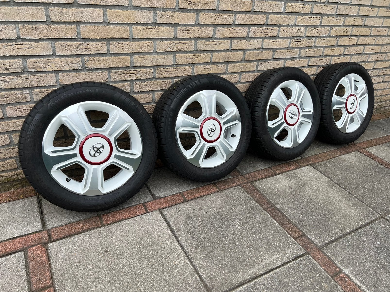 15 inch ORG Toyota ayga velgen met zomerbanden 4x100, Ophalen, 15 inch, Velg(en), 185 mm
