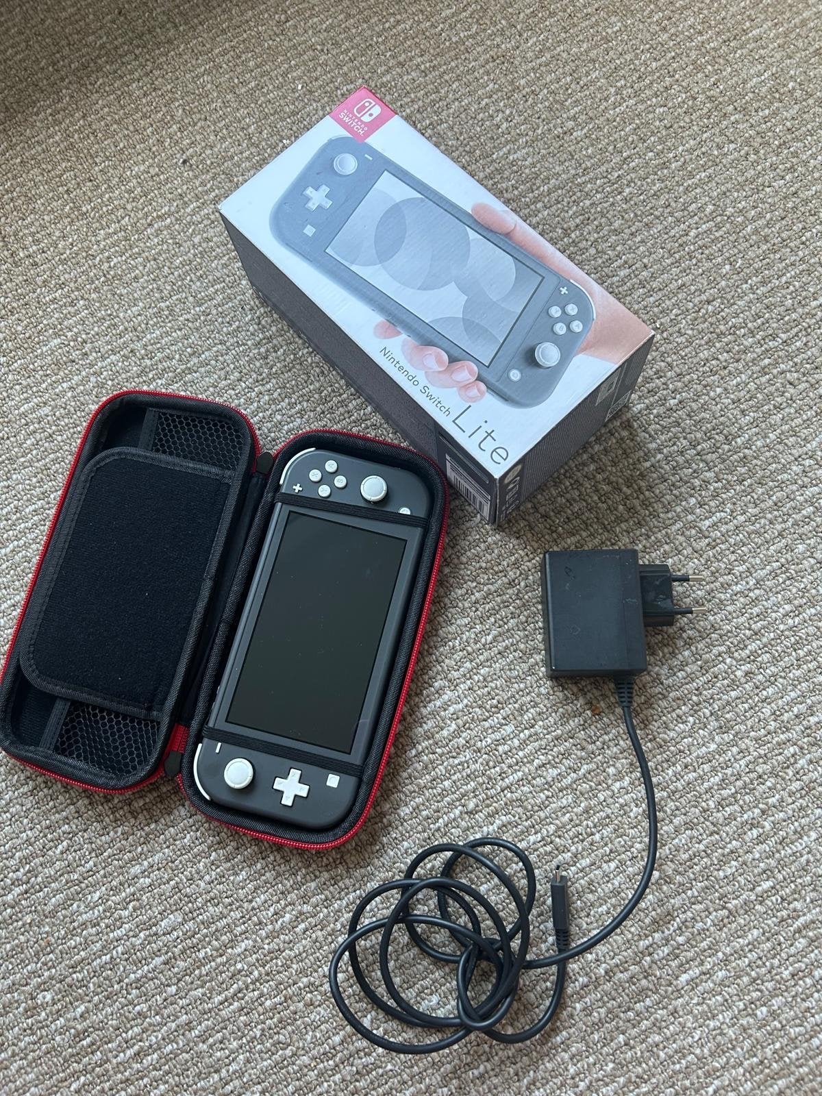 Nintendo Switch Lite Grijs met beschermhoes en doos, Spelcomputers en Games, Spelcomputers | Nintendo Switch Lite, Ophalen of Verzenden