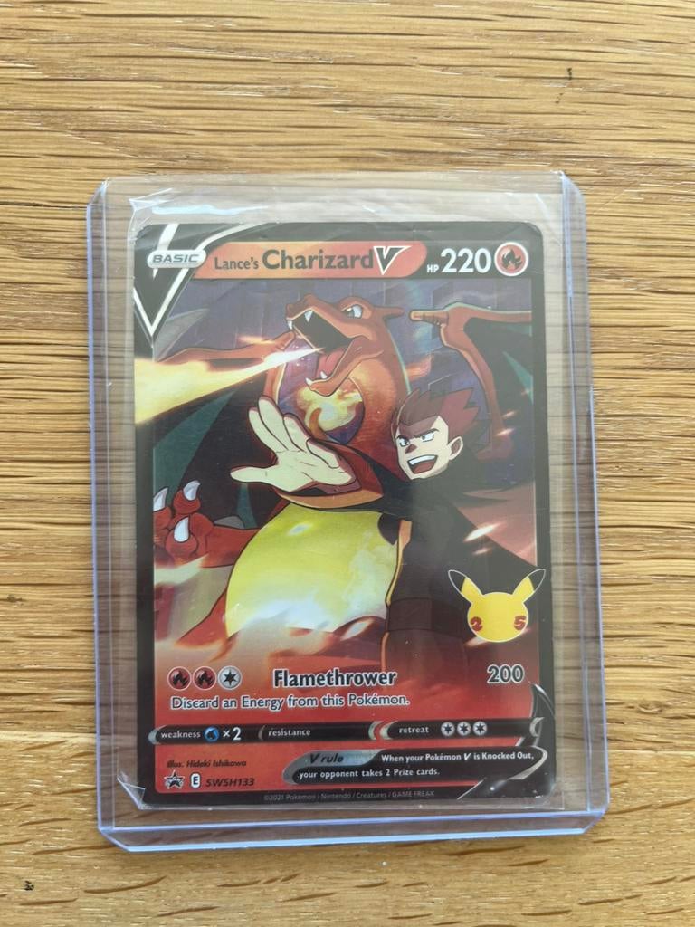 Pokémon Lance’s Charizard V Promo SWSH133 – Holo – Near Mint, Ophalen of Verzenden, Zo goed als nieuw