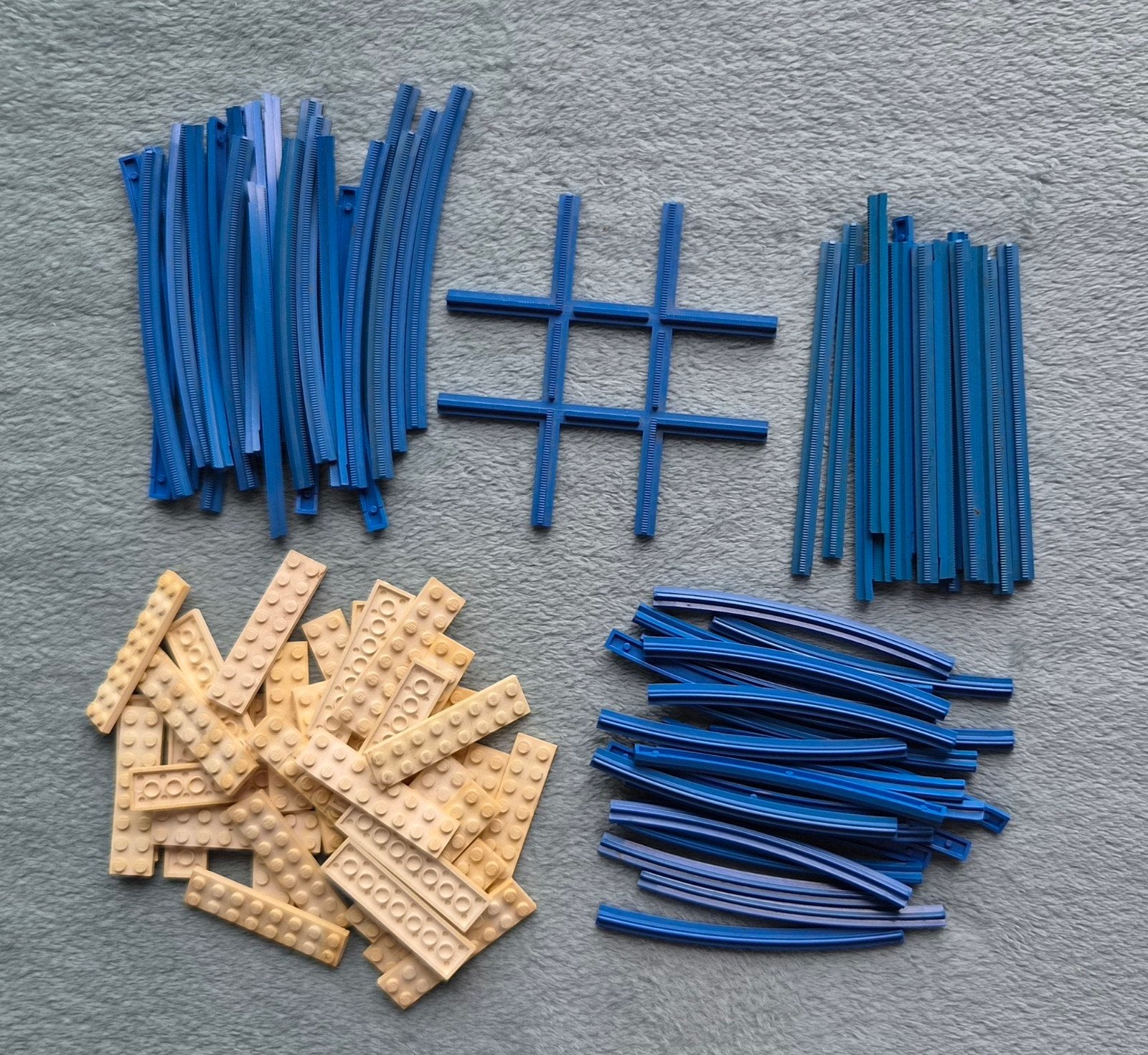 Lego trein 4,5 Volt blauwe rails met kruispunt + bielzen., Ophalen of Verzenden, Gebruikt, Losse stenen, Lego