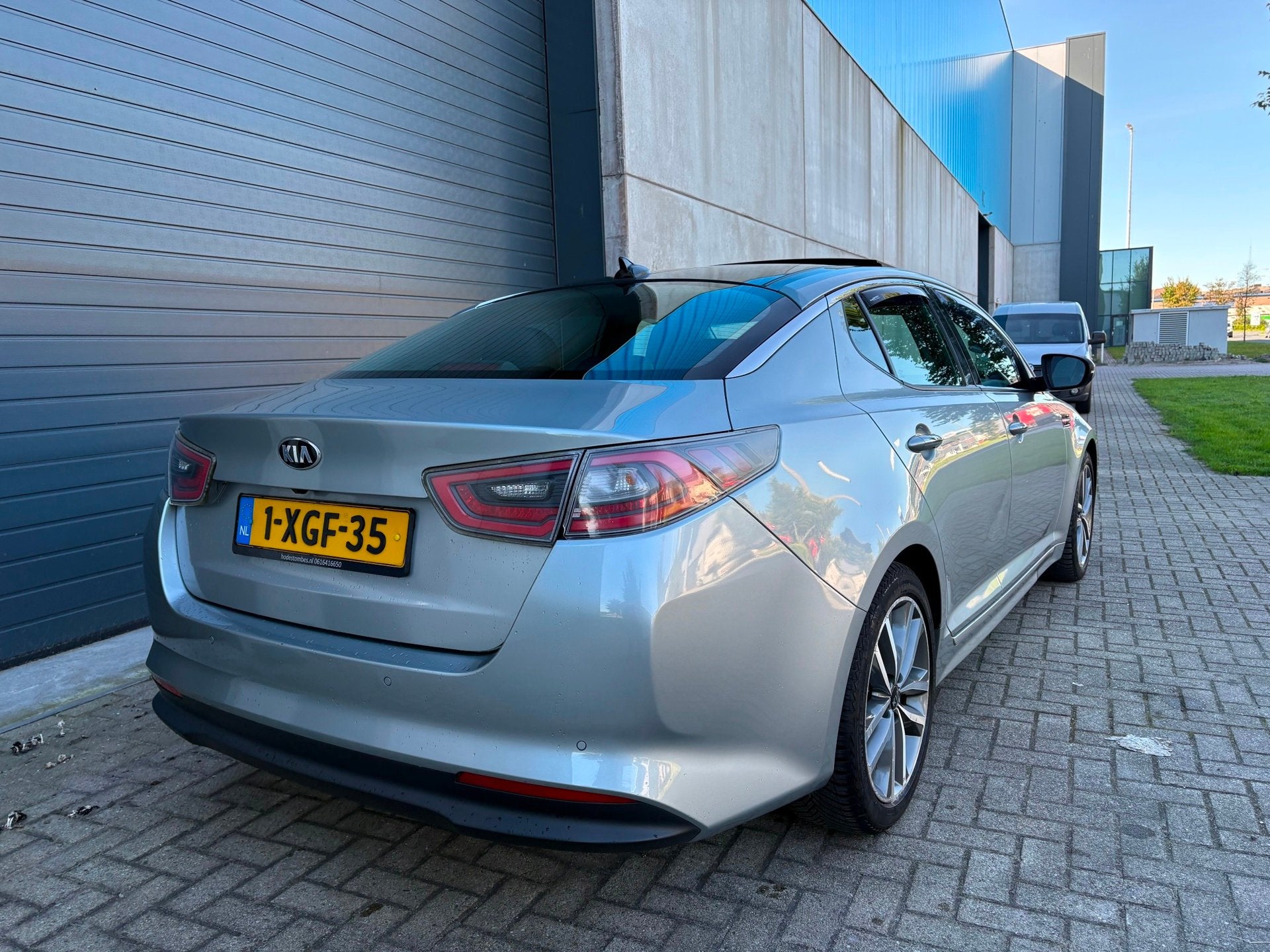 Kia Optima 2.0 CVVT Hybrid Executive Line AUT PANO LEDER, Auto's, Euro 5, Gebruikt, Zwart, 4 cilinders