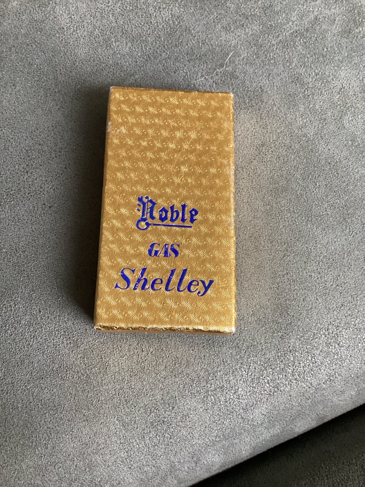 Noble Gas Shelley aansteker goudkleurig nieuw in doos, Ophalen of Verzenden, Nieuw, Aansteker
