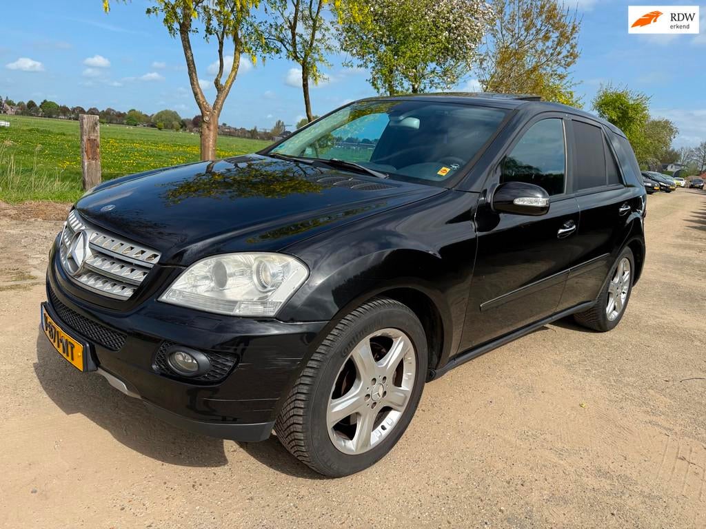 Mercedes-Benz M-klasse 320 CDI Schuifdak/Command/ Grijs kent, Auto's, Automaat, 2240 kg, Gebruikt, Zwart