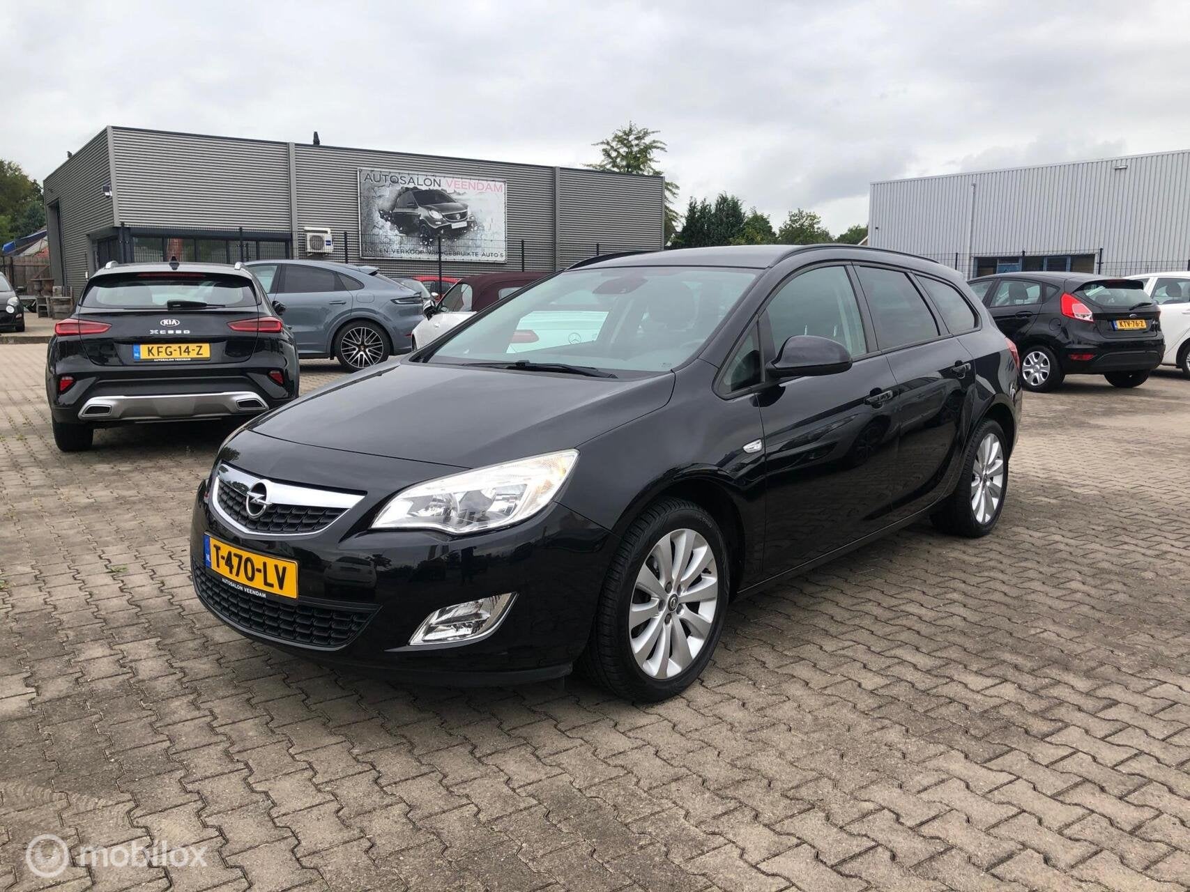 Opel Astra Sports Tourer 1.4 Turbo Cosmo Navi Cruise Airco, Auto's, Voorwielaandrijving, Euro 5, Stof, Gebruikt