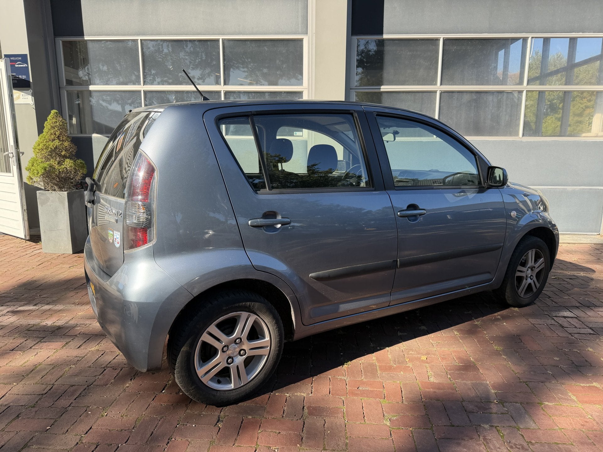 Daihatsu Sirion 2 1.3-16V Comfort Bj 2007 airco,lmv,cv,radio, Auto's, Voorwielaandrijving, Dealer onderhouden, Stof, Gebruikt