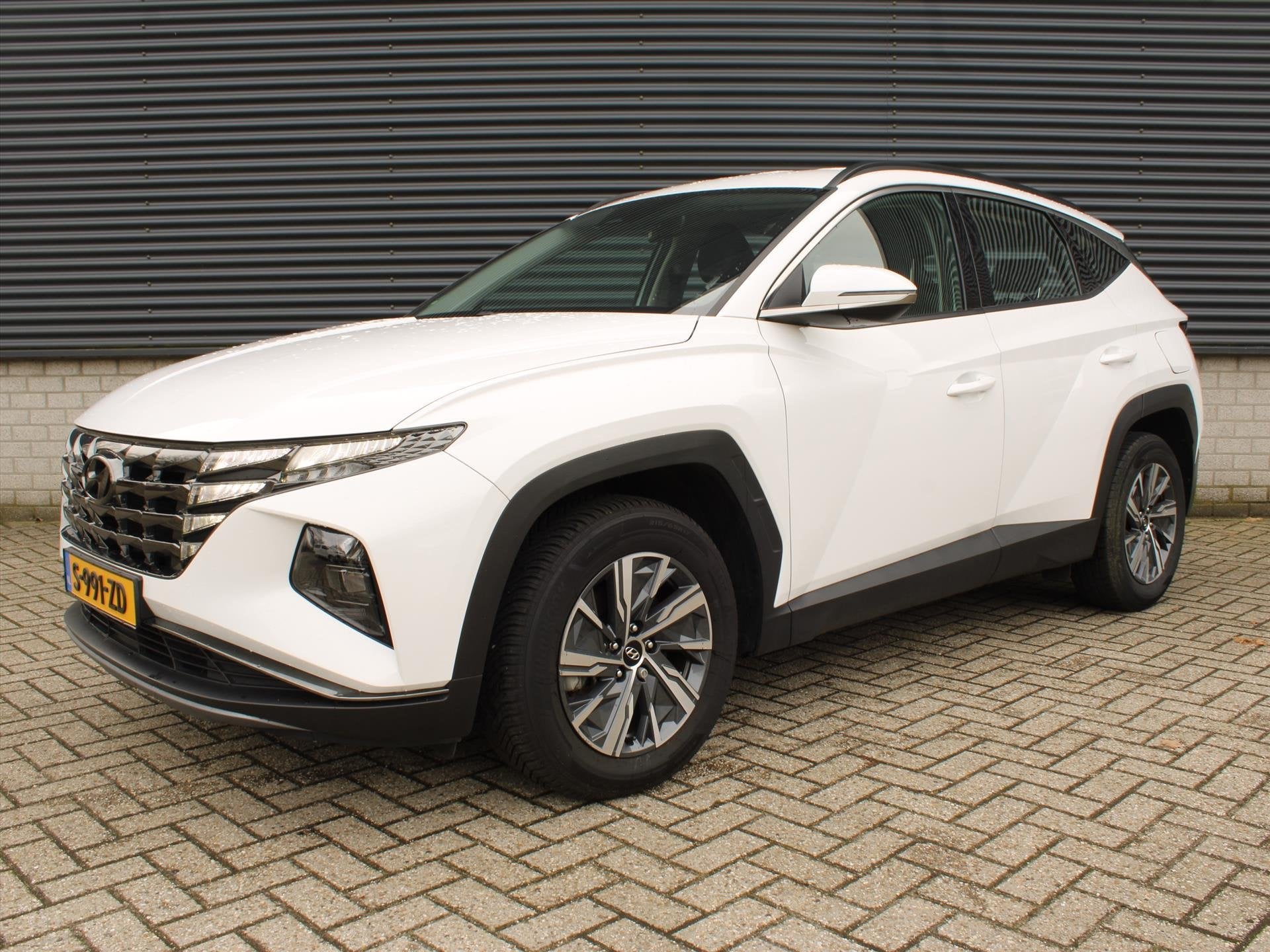 Hyundai Tucson Comfort 1.6 T-GDi HEV 230pk Automaat | Adapti, Stof, Gebruikt, 4 cilinders, 1650 kg