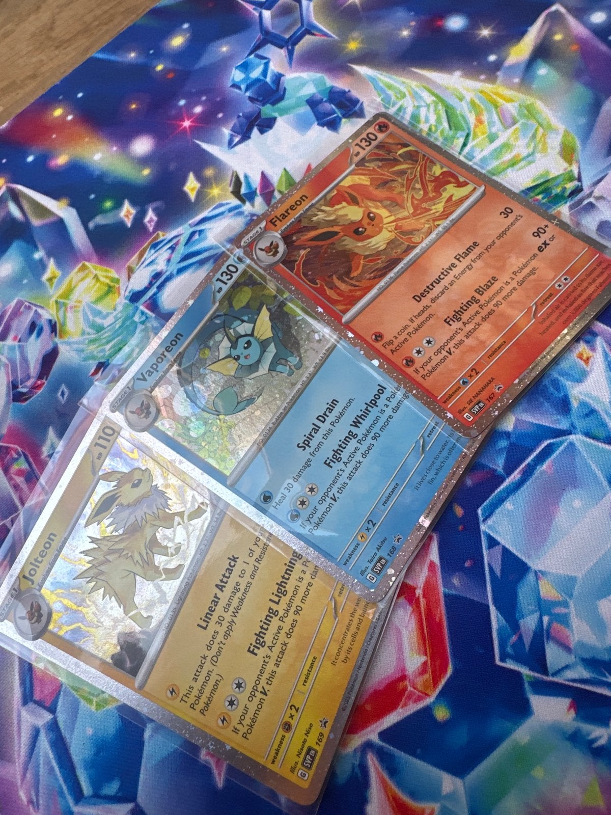 Flareon, Vaporeon, Jolteon Cosmos Holo Promoset Pokémon, Ophalen of Verzenden, Zo goed als nieuw, Meerdere kaarten, Foil