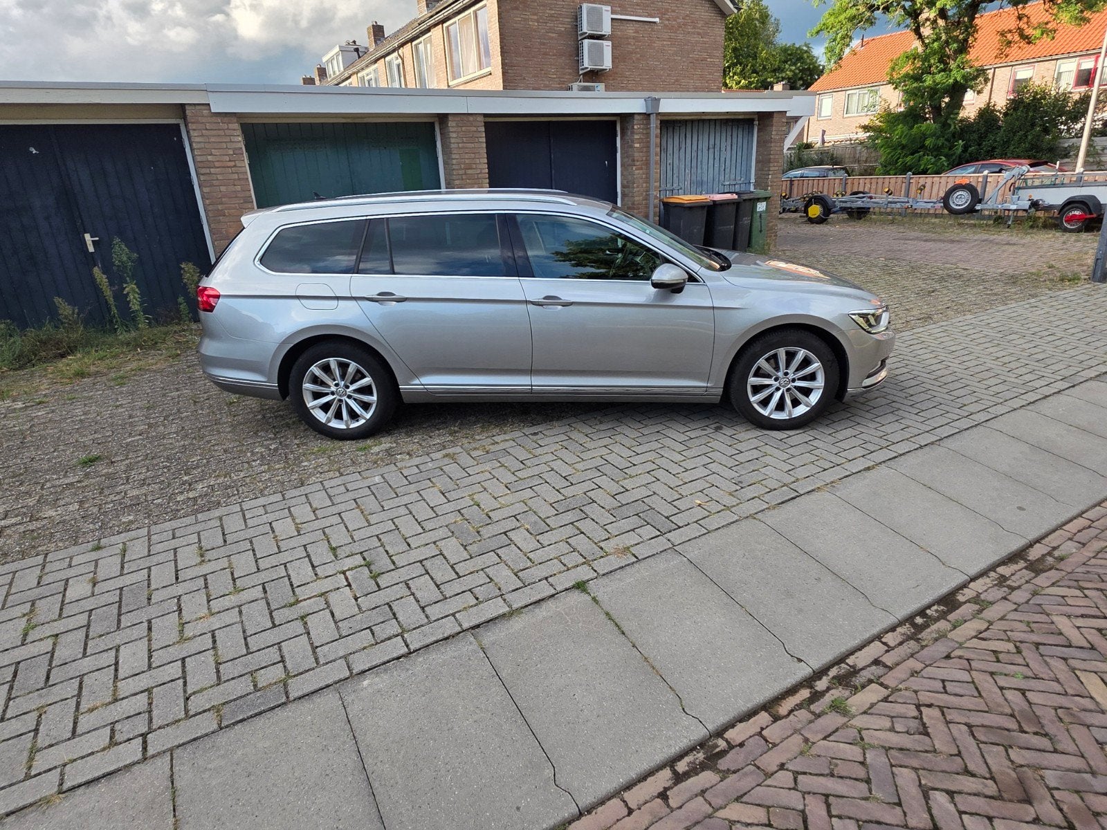 Volkswagen Passat 1.6 TDI 88KW BMT Variant 2015 Grijs, Auto's, Volkswagen, Lichtsensor, 4 cilinders, Origineel Nederlands, Stationwagon
