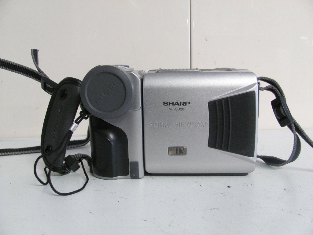 Sharp miniDv camera zonder ac/dc voedingsadapter, Overige merken, Mini dv, 20x of meer, Ophalen of Verzenden