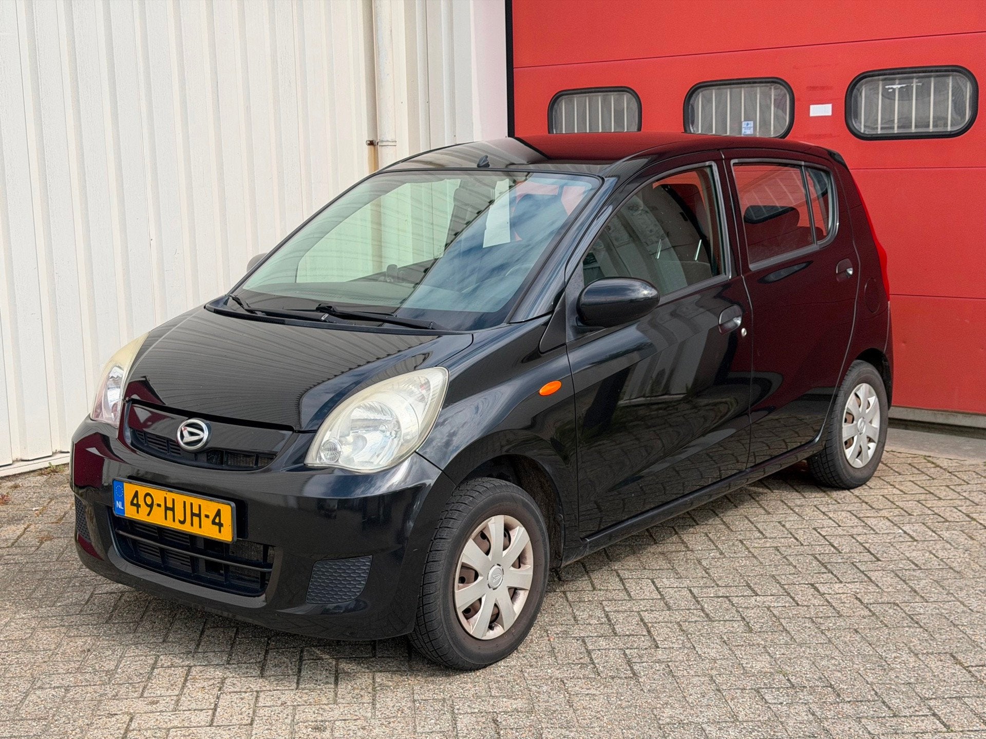 Daihatsu Cuore 1.0 Trend, Auto's, Voorwielaandrijving, Airbags, 18 €/maand, 4 stoelen
