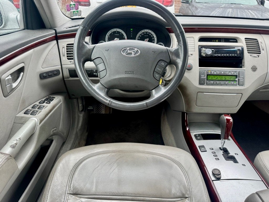Hyundai GRANDEUR 3.3i V6 Style AUT LEER CLIMA PDC NAP APK, Auto's, Bedrijf, 3342 cc, Grandeur, 1639 kg