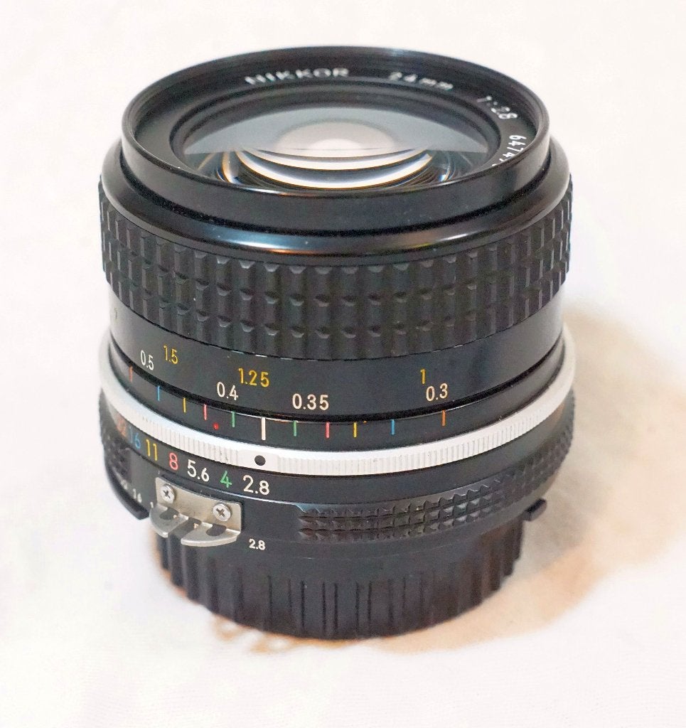Nikon - Nikkor 24mm f2.8 (647490) Ai, Verzamelen, Ophalen of Verzenden
