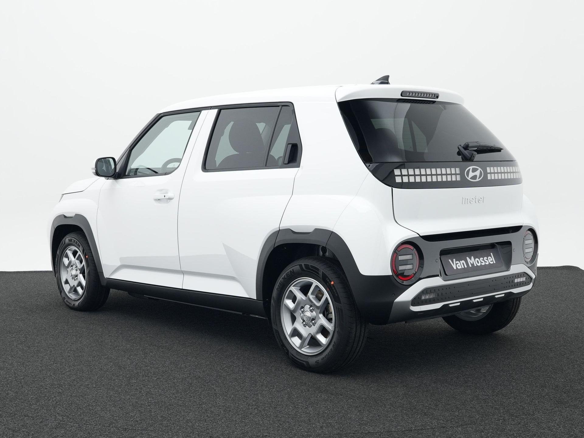 Hyundai INSTER Pulse 49 kWh | Warmtepomp | Stuurverwarming |, Auto's, Hyundai, 12 maanden, Stof, Zwart, Automatische klimaatregeling