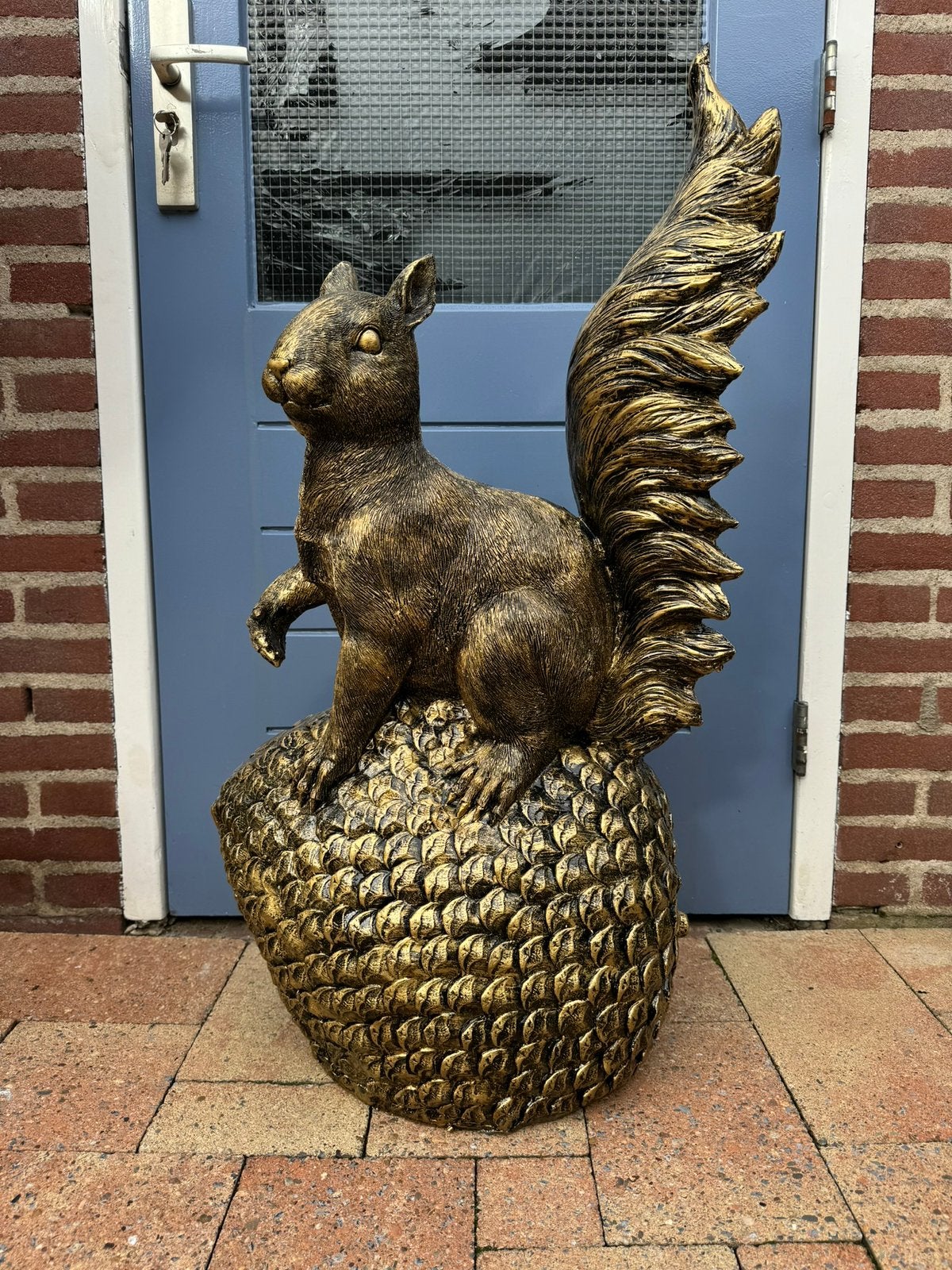 eekhoorn (goud/zwart) 97hoog 50breed 30diep/Nieuw!, Ophalen, Nieuw