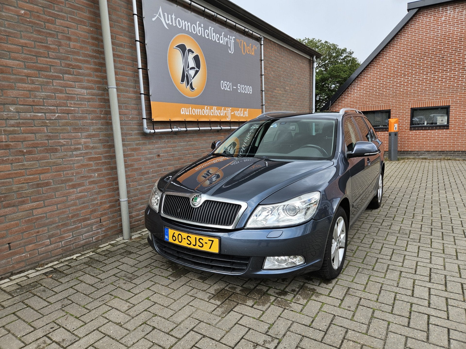 Skoda Octavia Combi 1.2 TSI Elegance Business Line, Auto's, Euro 5, Stof, Gebruikt, Zwart