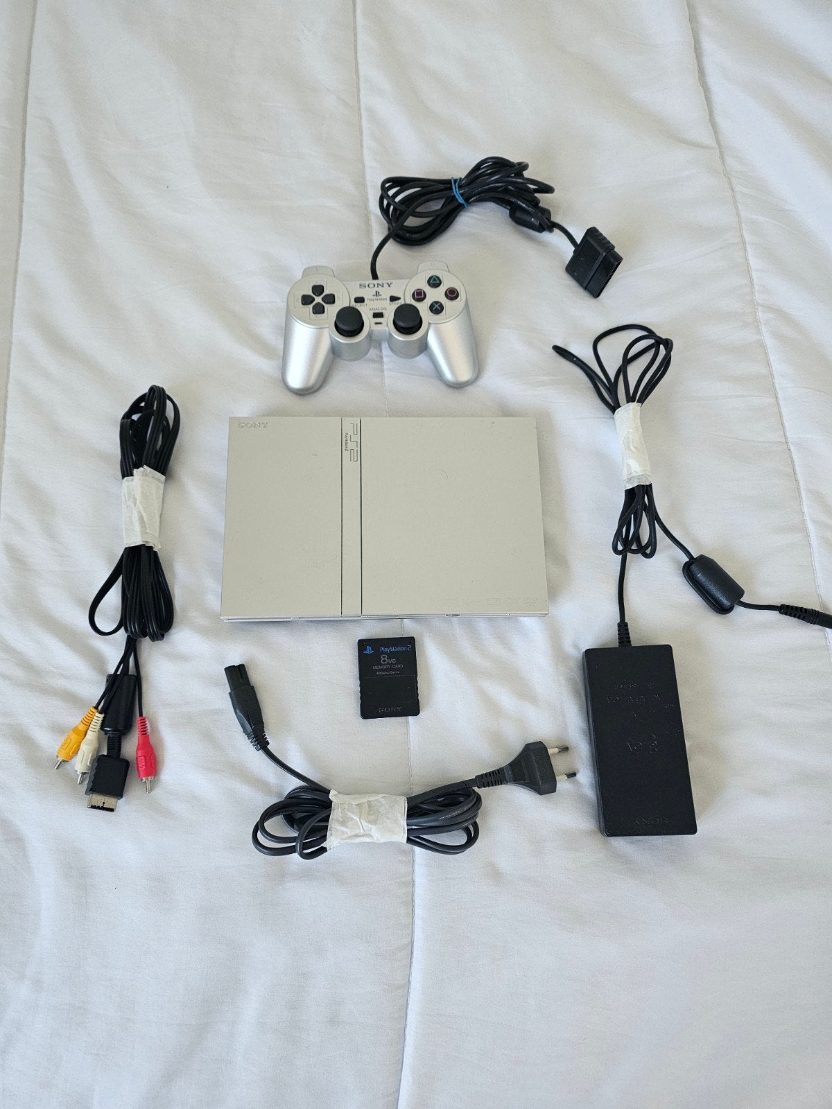 PlayStation 2 Slim Silver Inclusief 8 Games En Memorykaart, Ophalen, Met games, Zo goed als nieuw, Met 1 controller