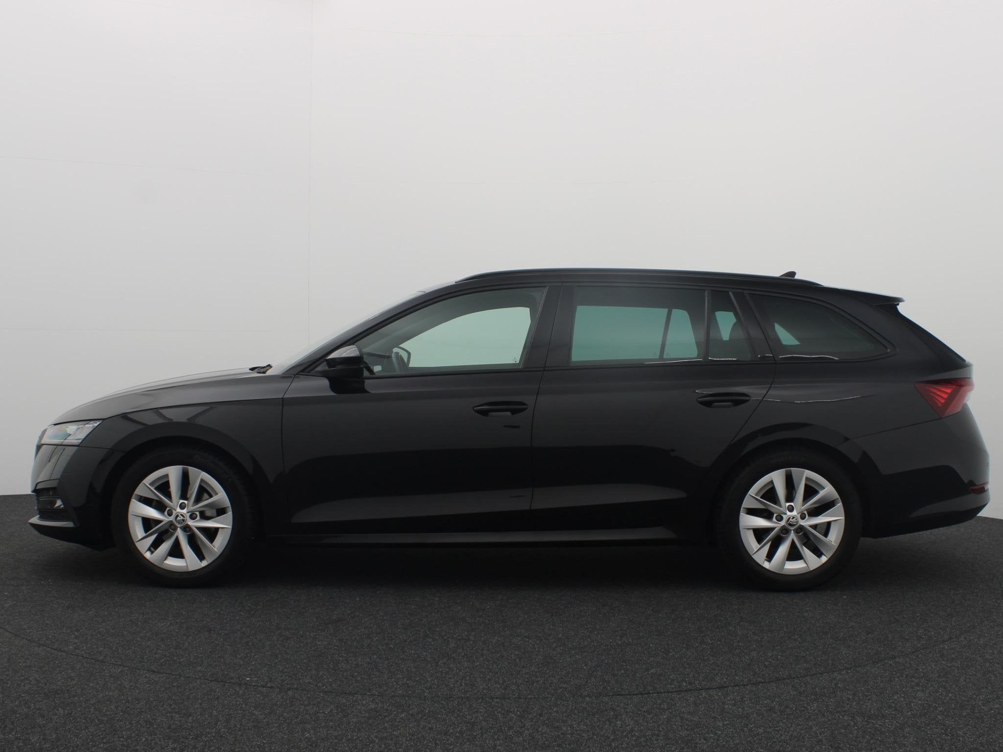 Skoda Octavia Combi 1.0 TSI Sport Business TREKHAAK / RS-STO, Dealer onderhouden, Stof, Gebruikt, Zwart