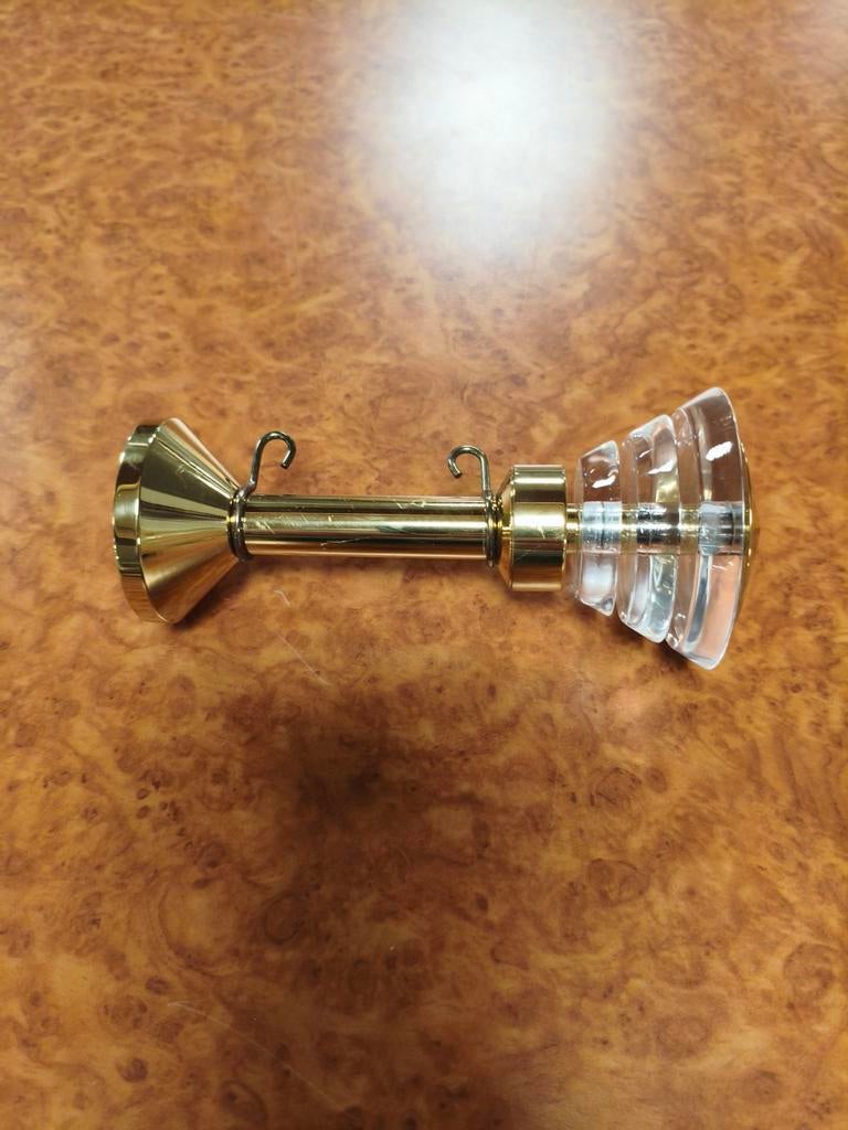 Embrassehaken messing, Ophalen